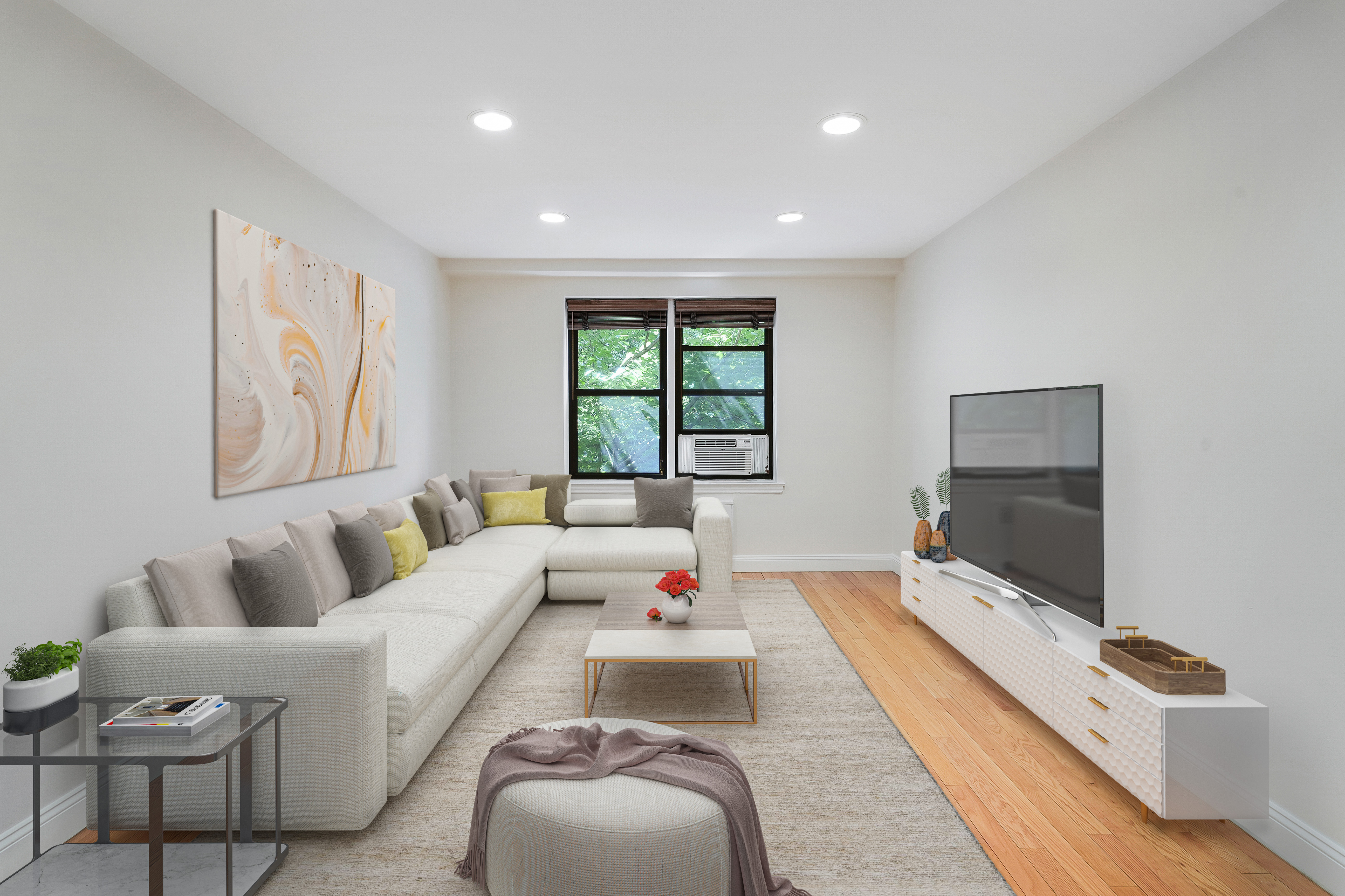 a living room with furniture and a flat screen tv