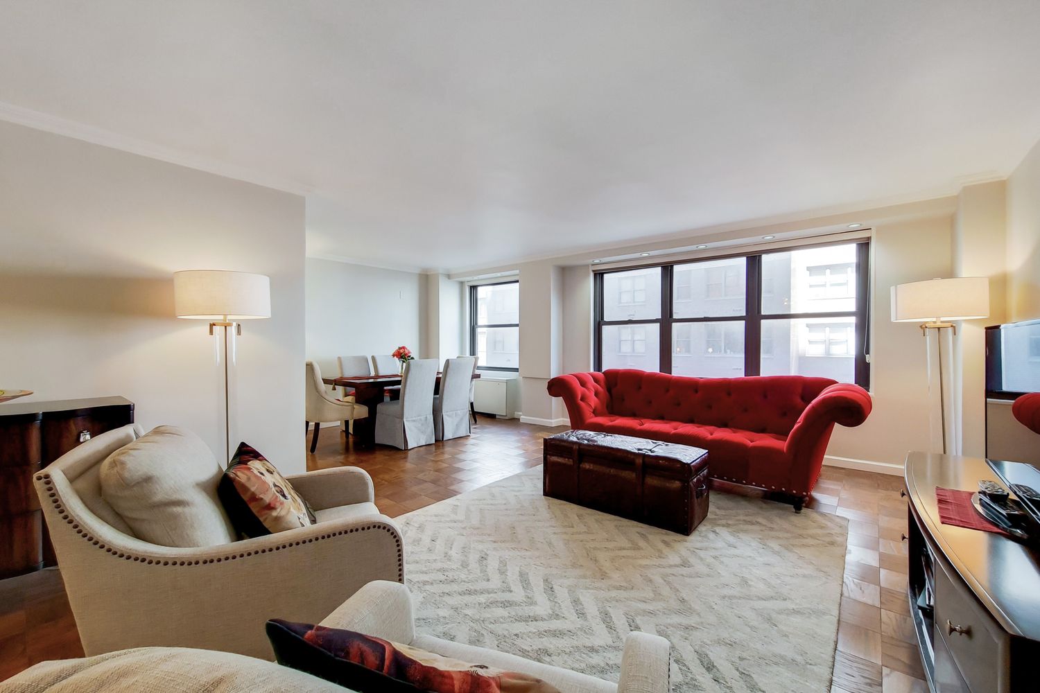 a living room with furniture and a window