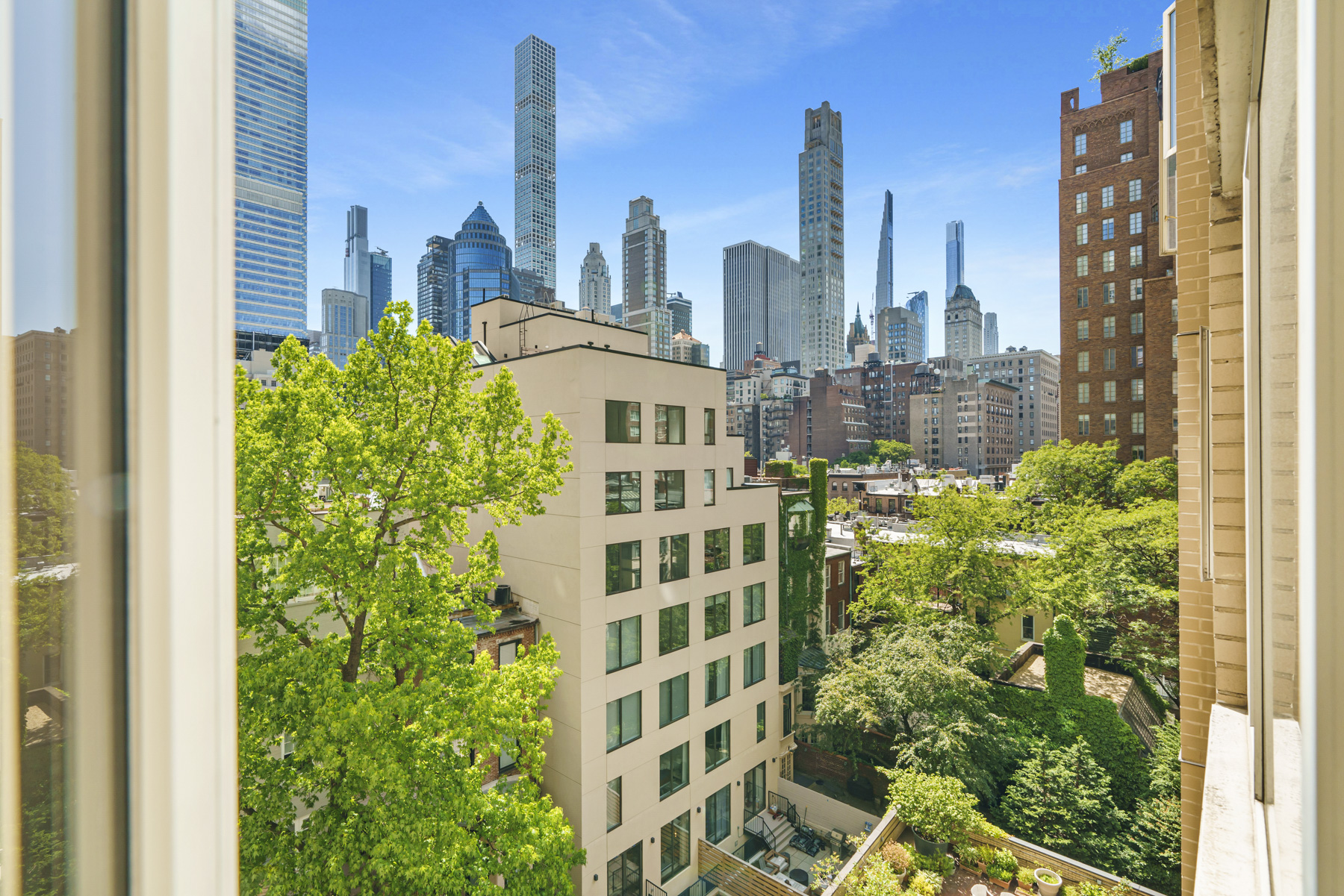 a view of a city with tall buildings