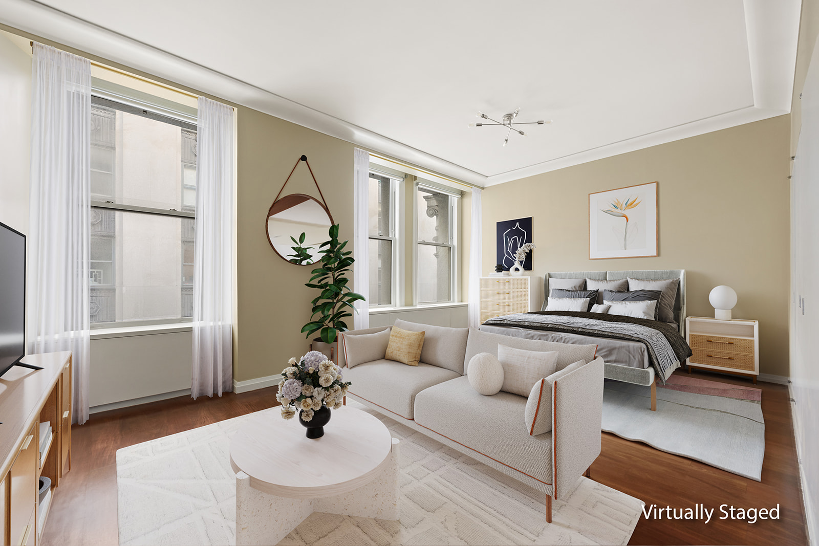 a living room with furniture a chandelier and a window