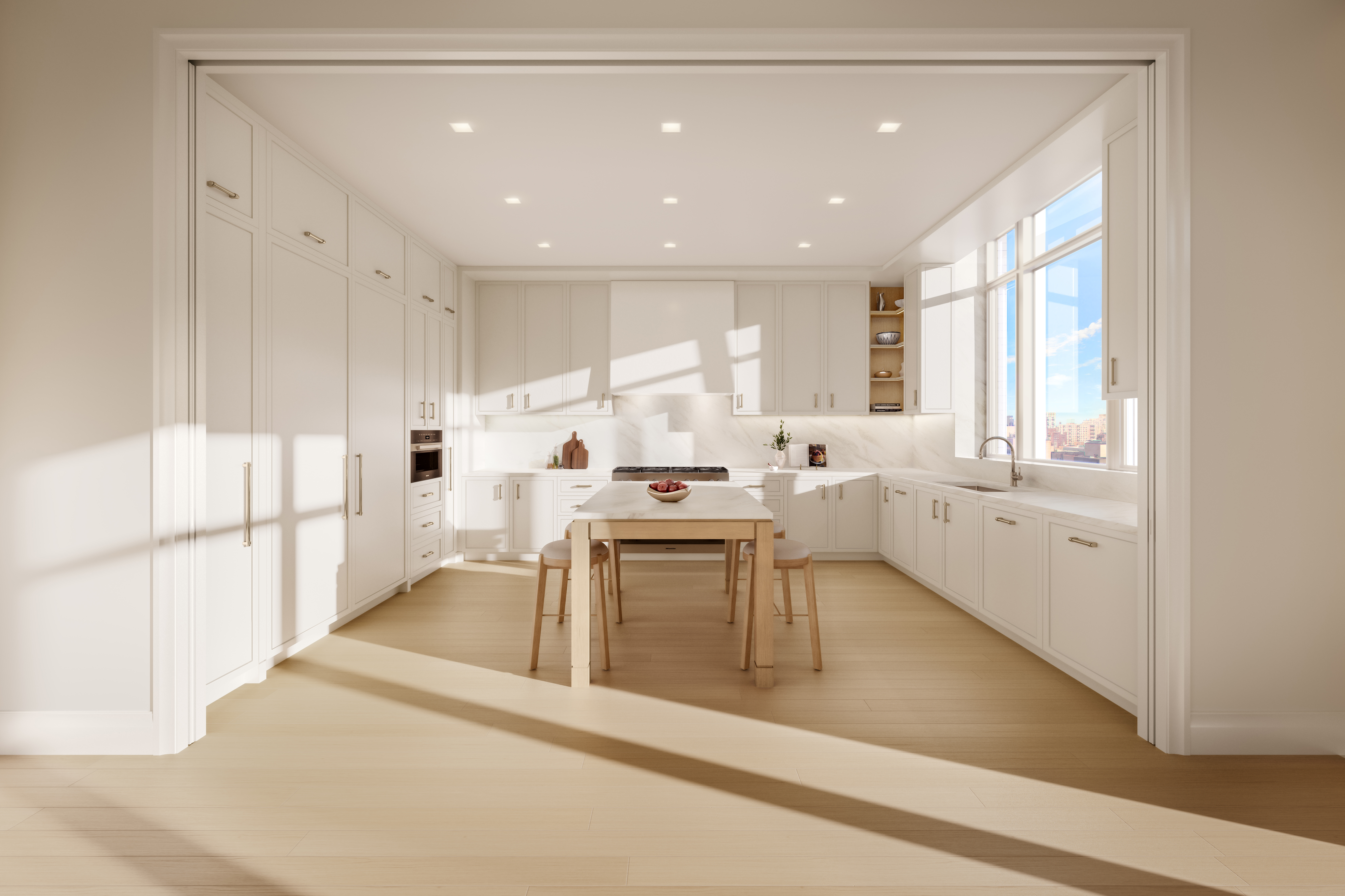 a kitchen with a sink stainless steel appliances and white cabinets