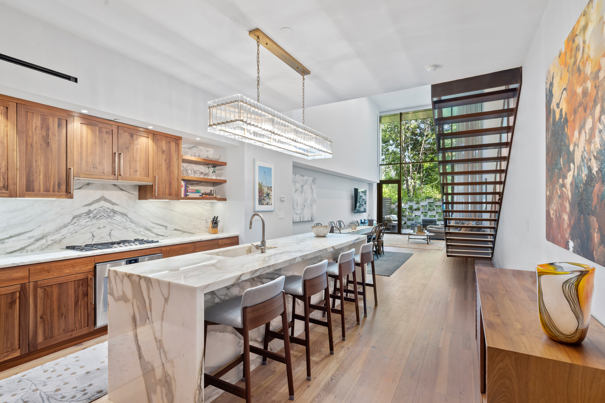 a view of a kitchen and dining room