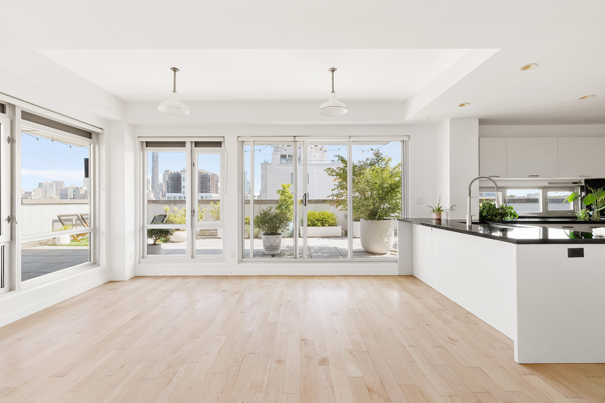 a view of a living room and front door