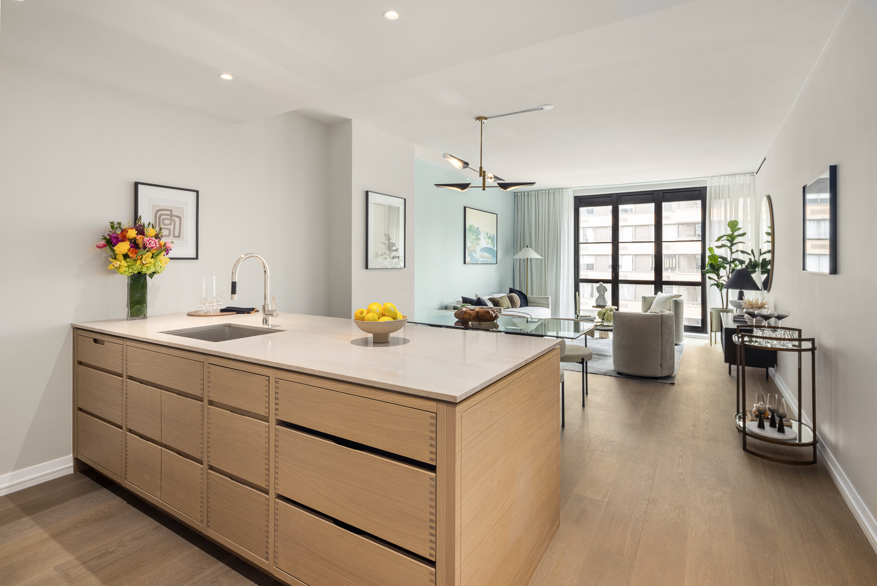 a kitchen with sink refrigerator and window