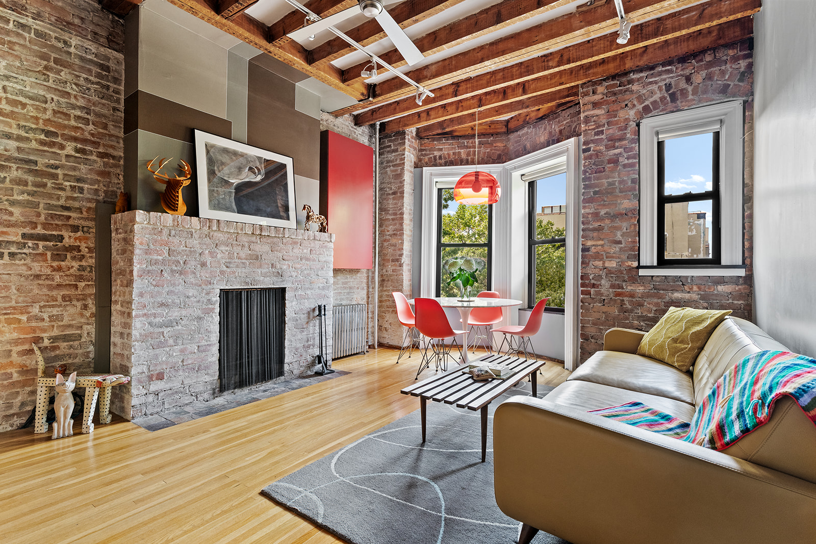 a outdoor living space with furniture and a fireplace