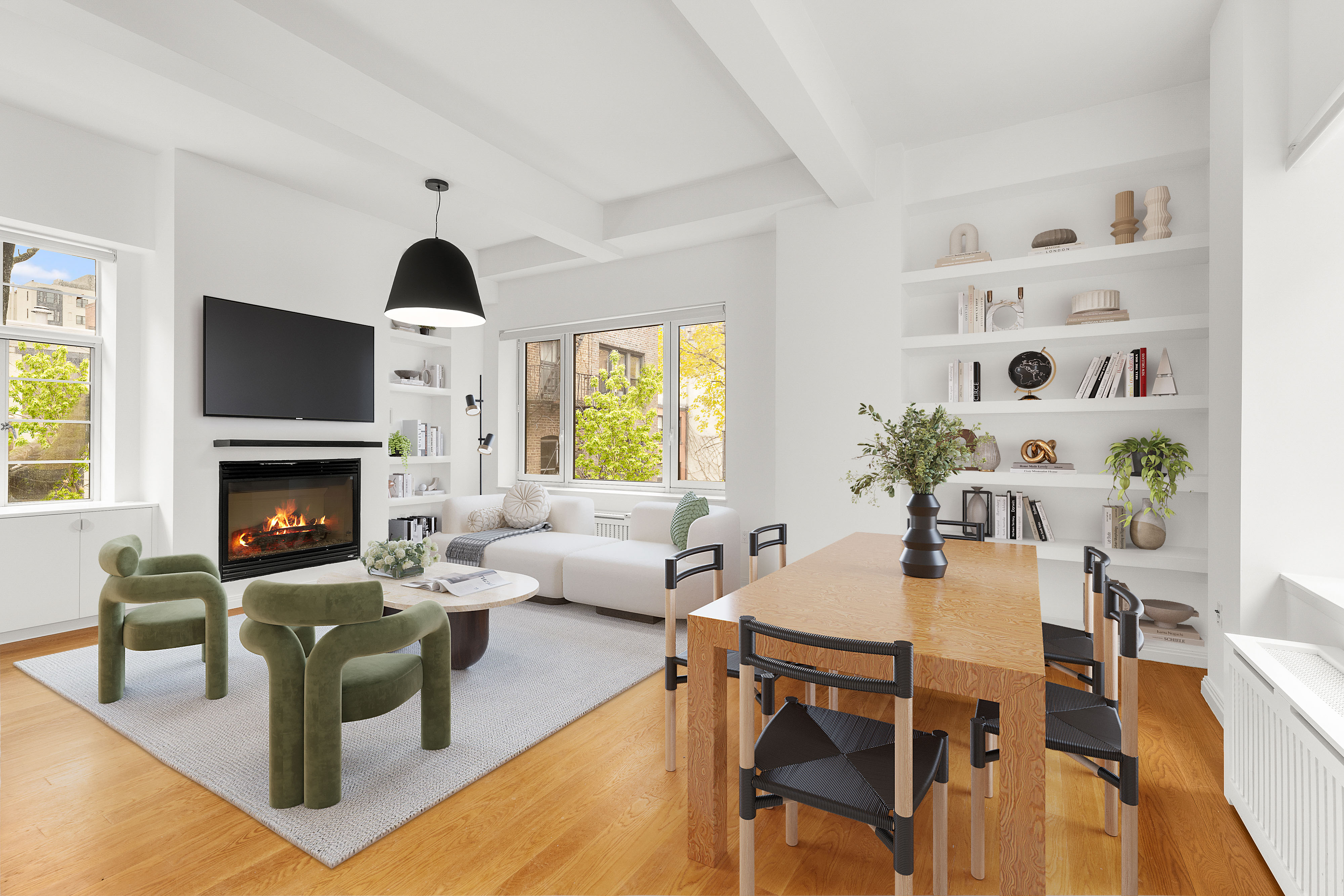 a living room with furniture fireplace and wooden floor