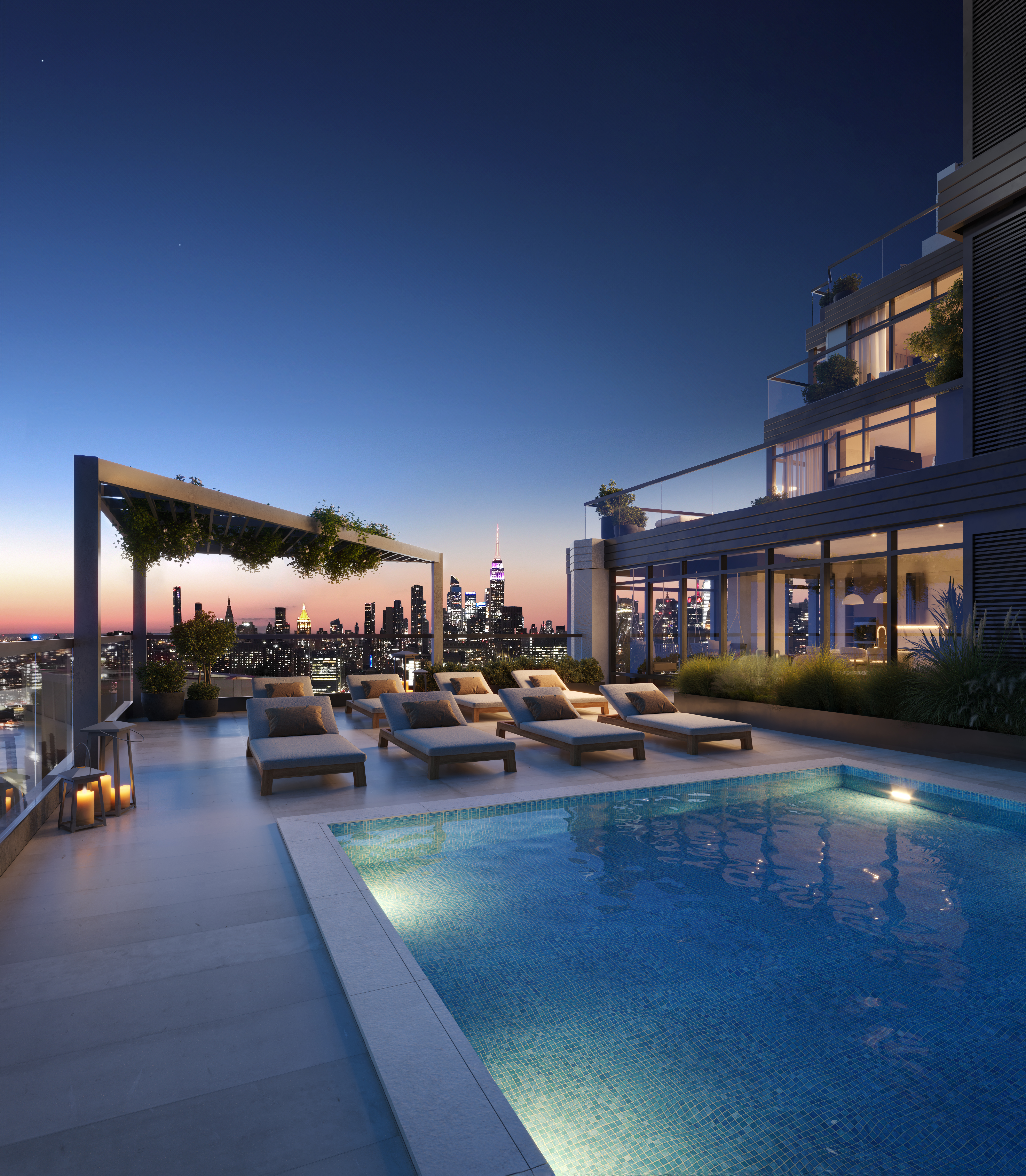 a view of a swimming pool and lounge chairs in patio