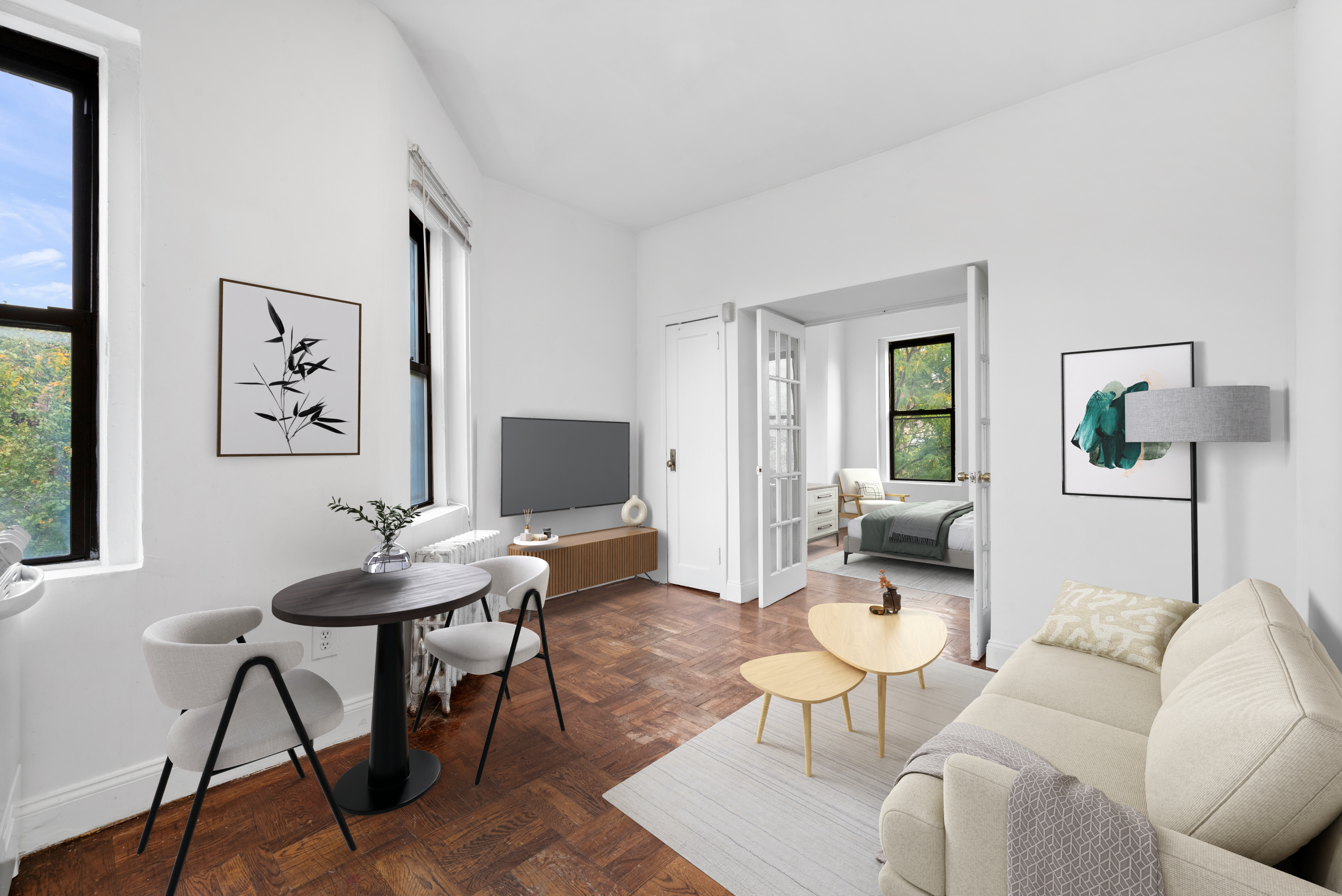 a living room with furniture and a flat screen tv