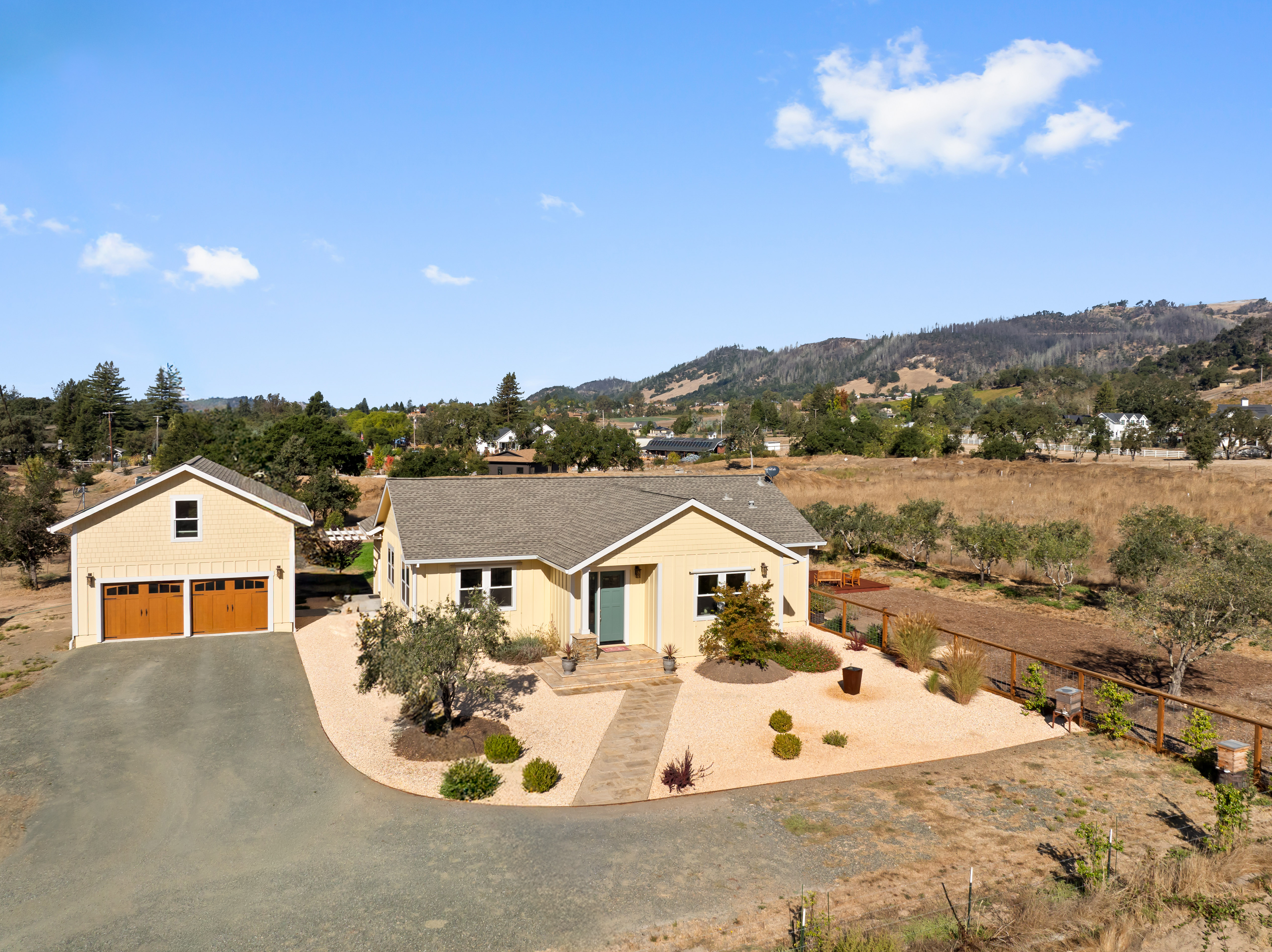 a view of a house with a yard