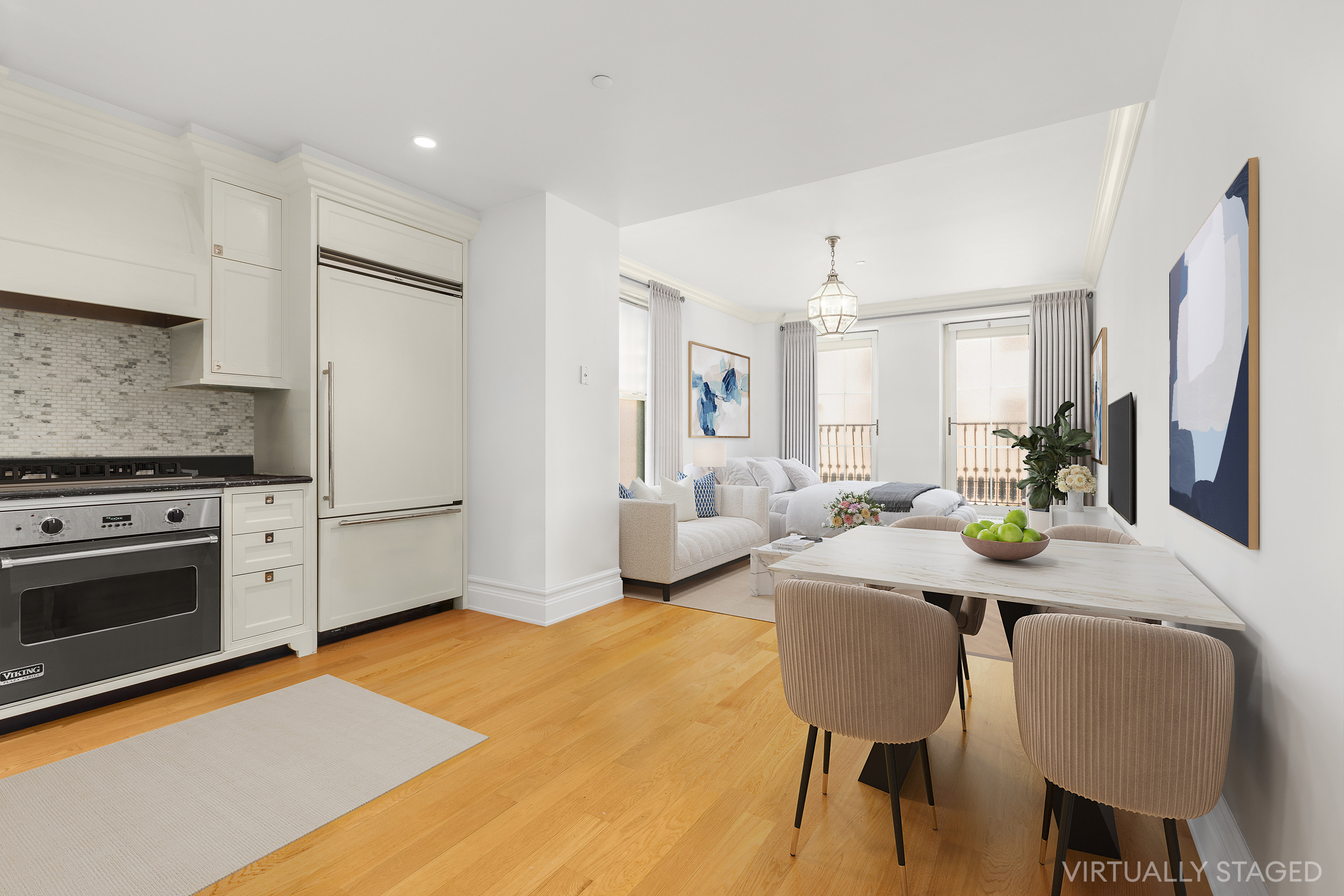 a view of a dining room with furniture and wooden floor