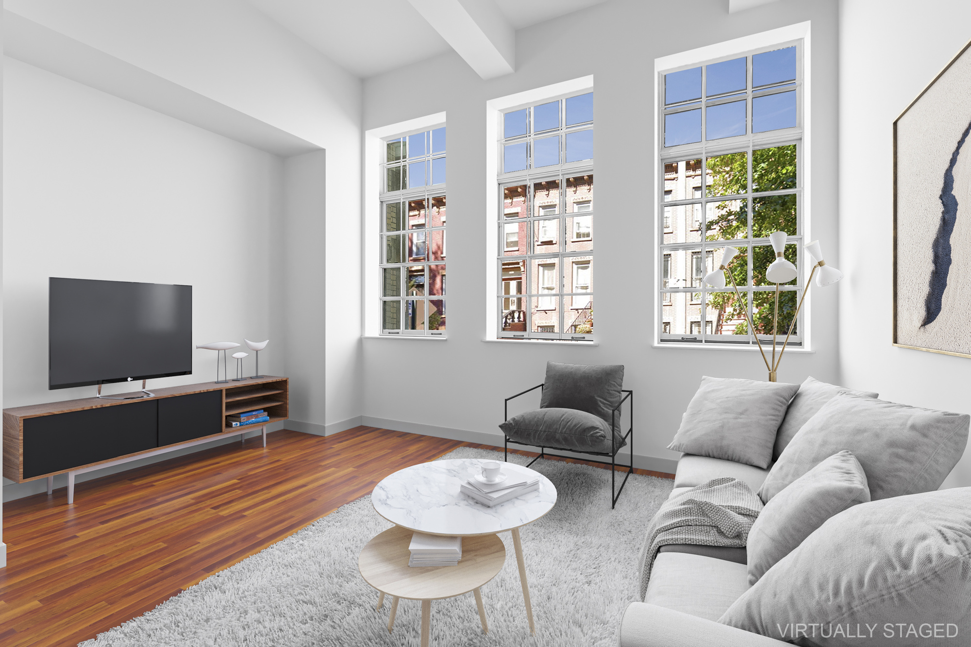 a living room with furniture and a flat screen tv