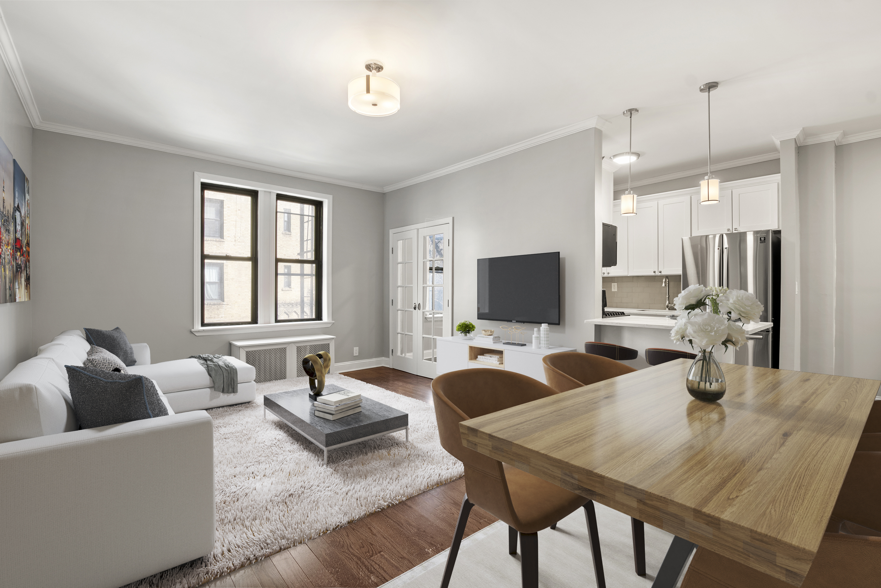 a living room with furniture a flat screen tv and a large window