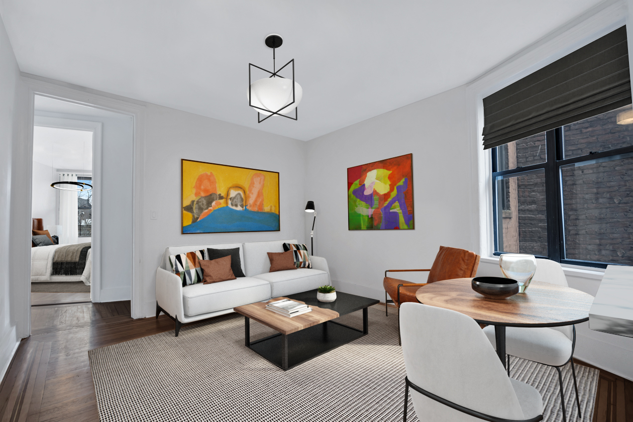 a living room with furniture kitchen view and a large window