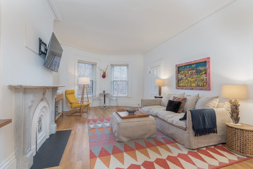 a living room with furniture and a couch