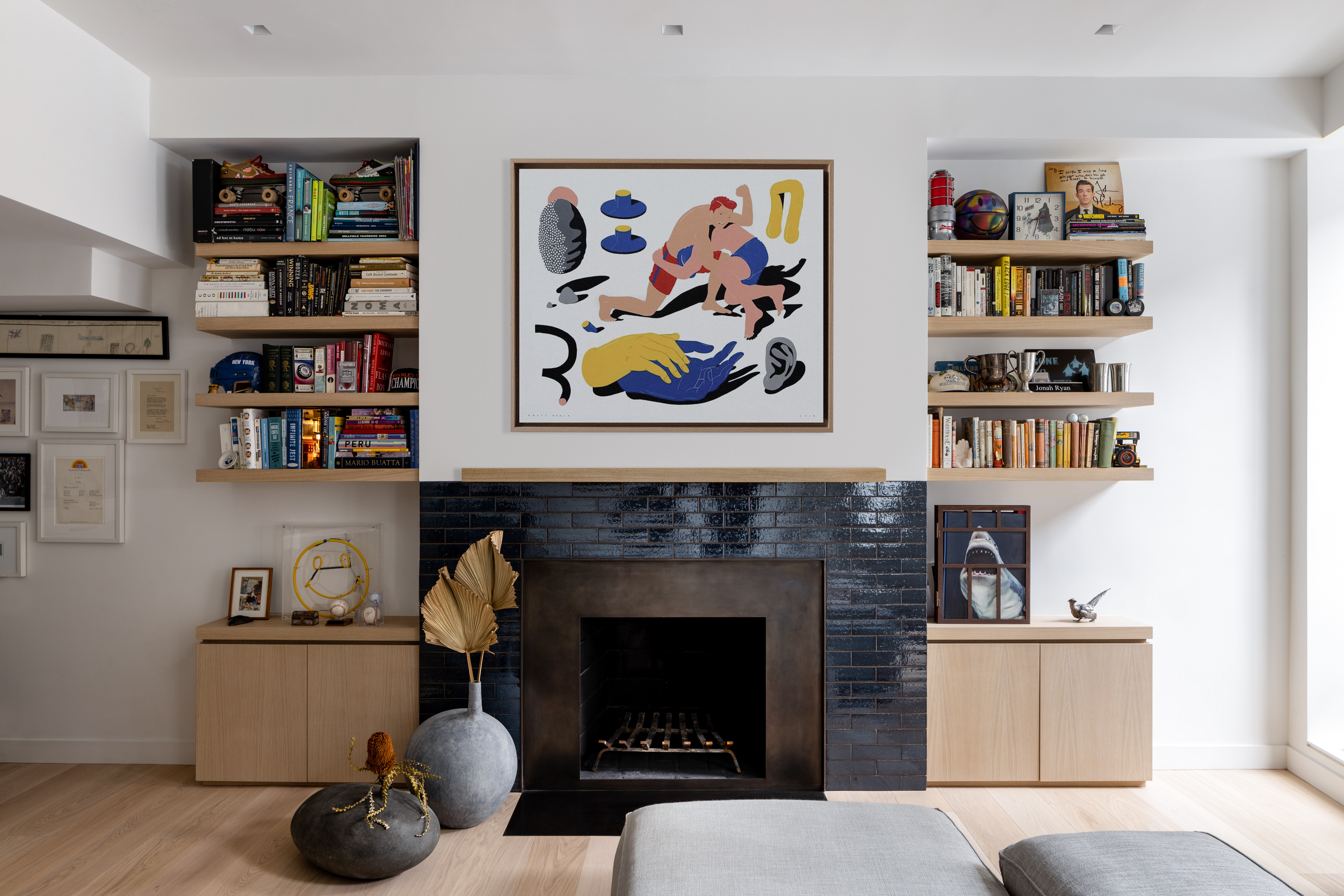 a living room with furniture and a fireplace