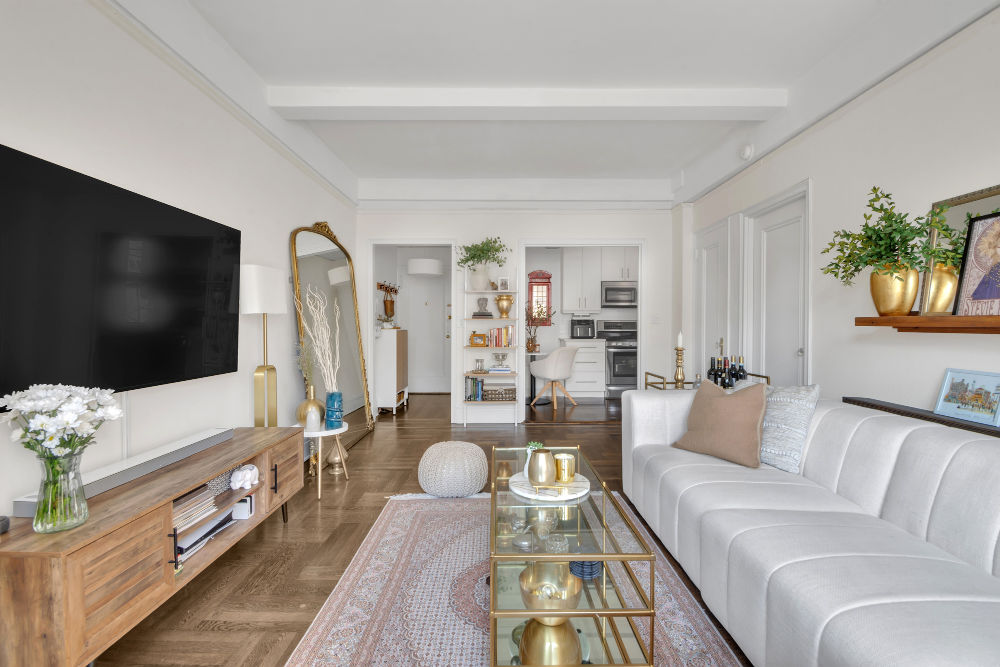 a living room with furniture fireplace and flat screen tv