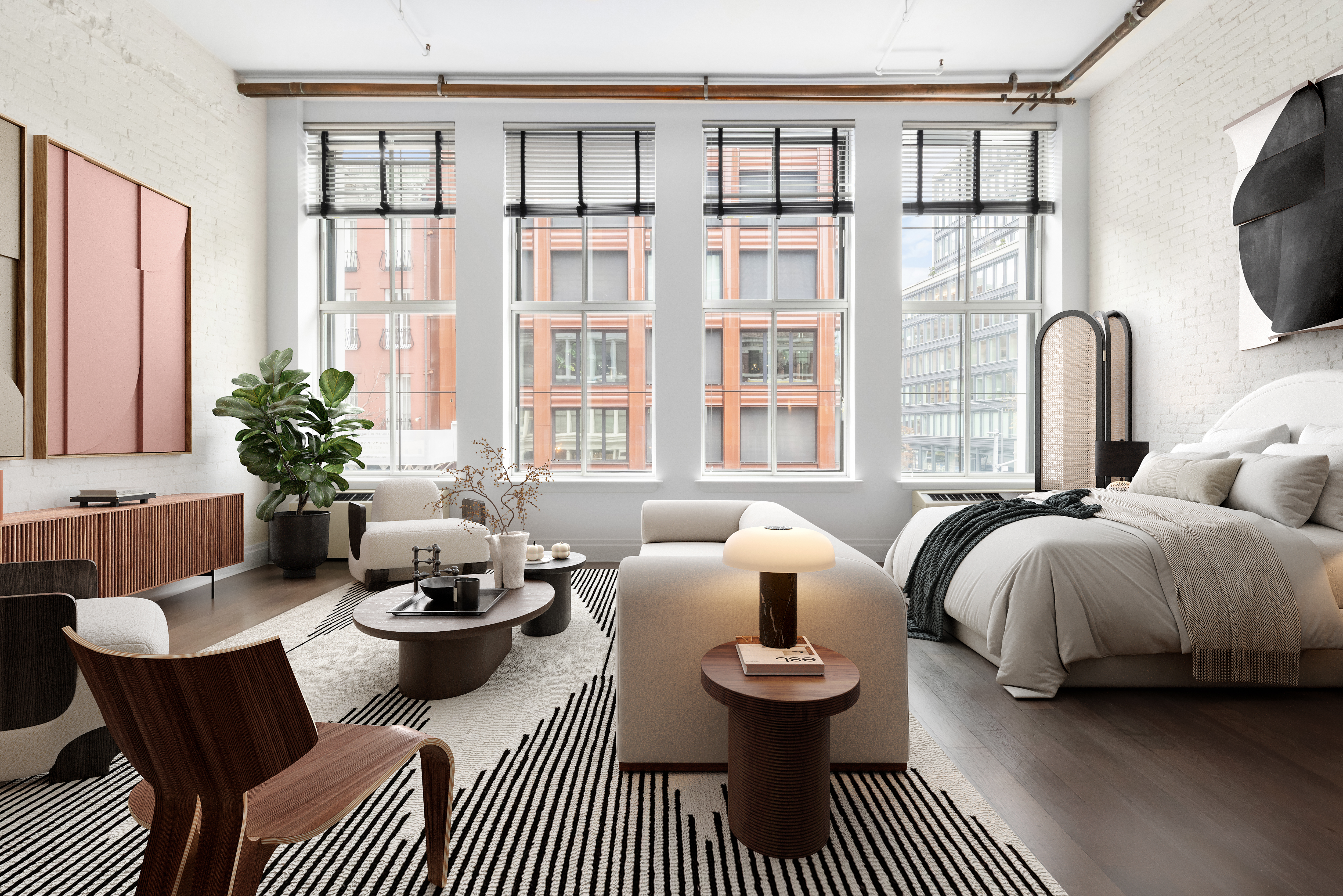 a bedroom with furniture and a potted plant