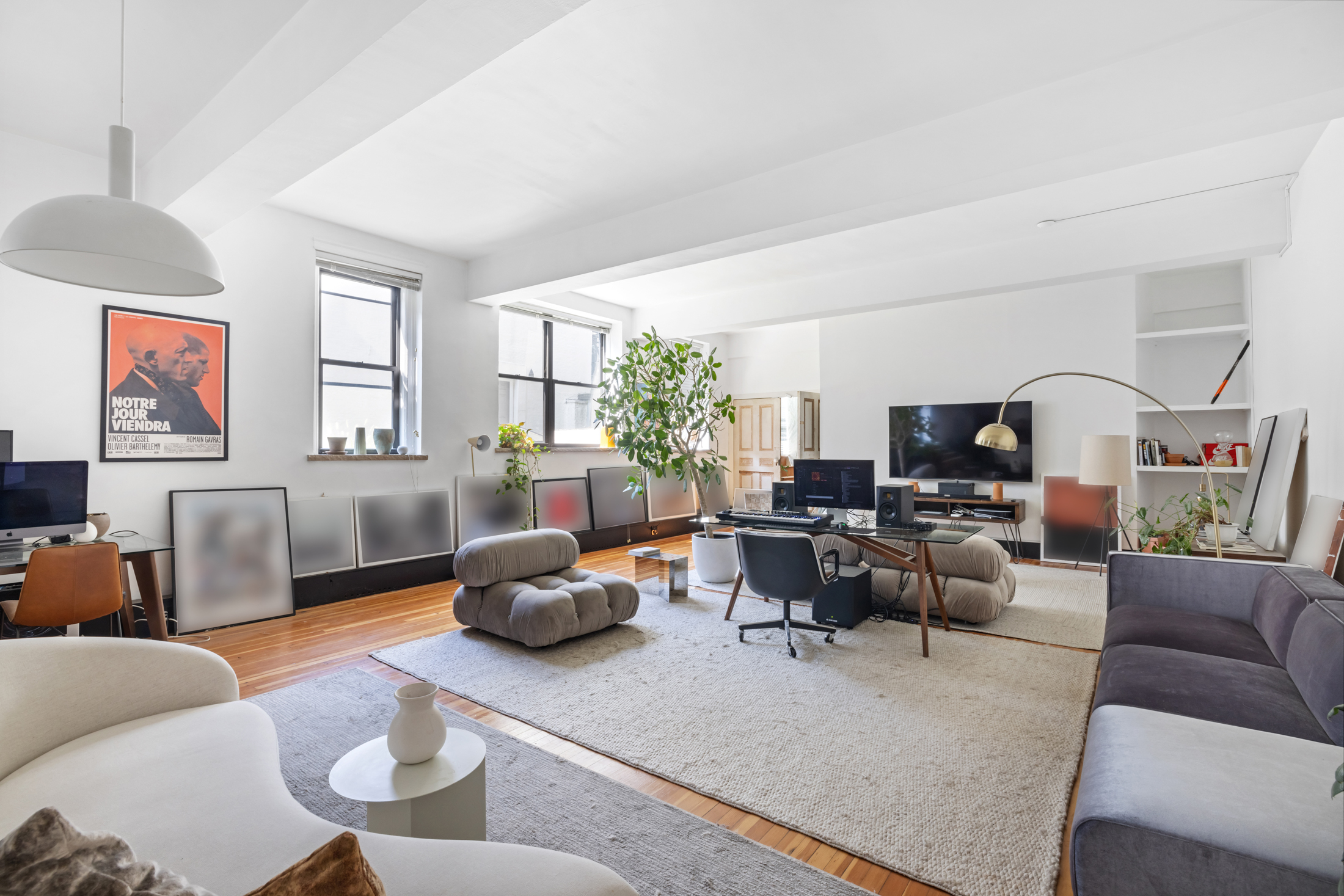 a living room with furniture or couch and a window