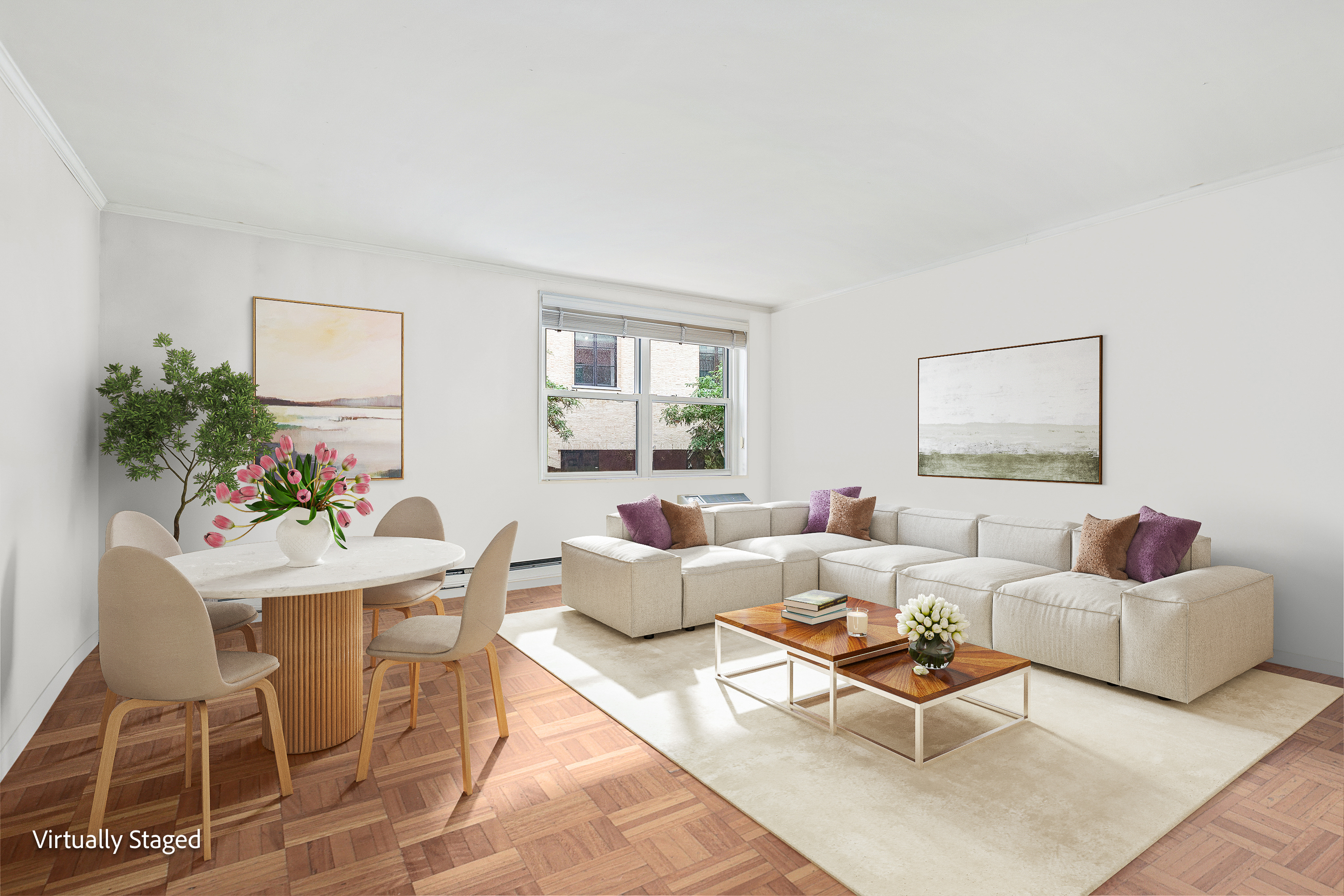 a living room with furniture and a potted plant