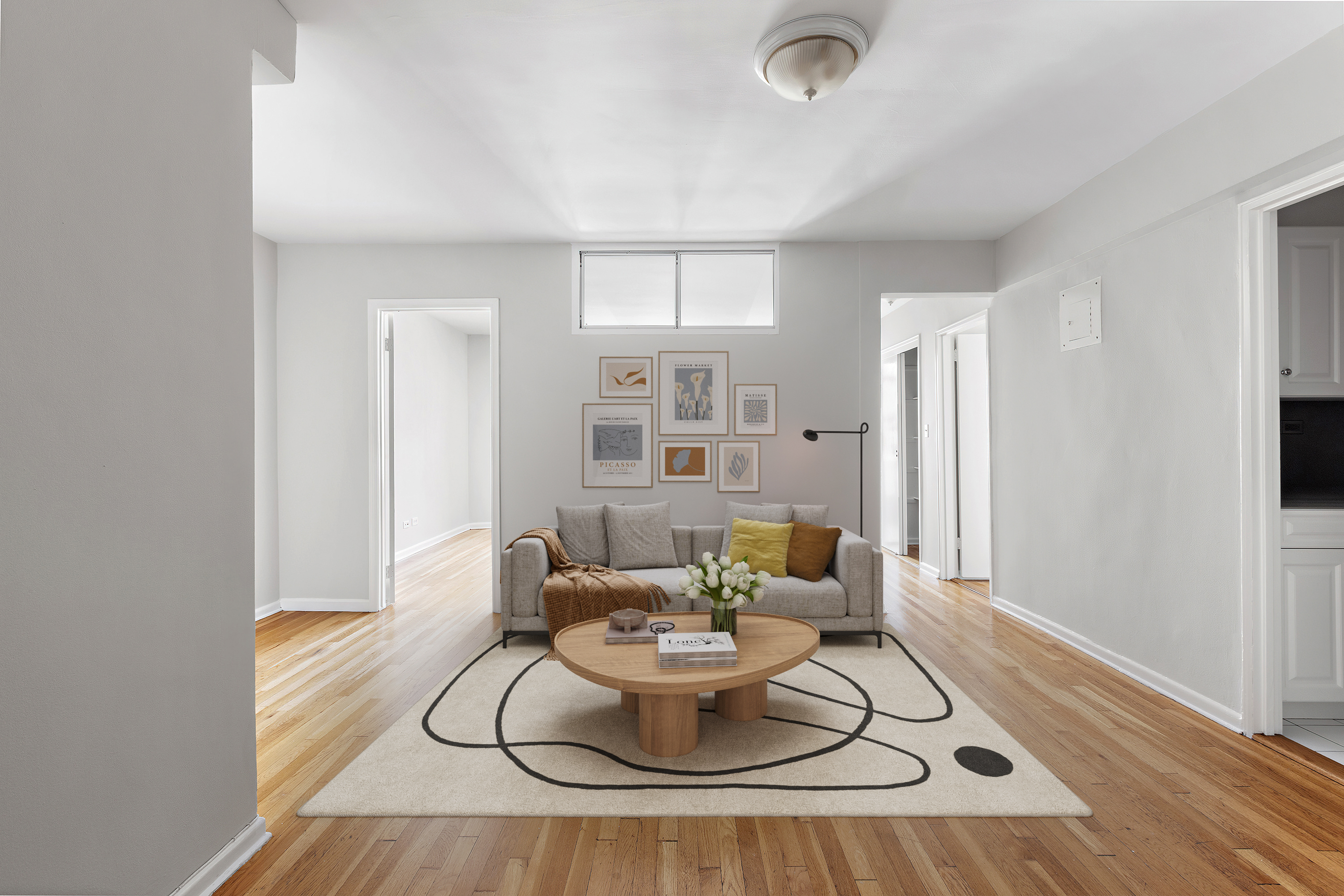 a living room with furniture and a window