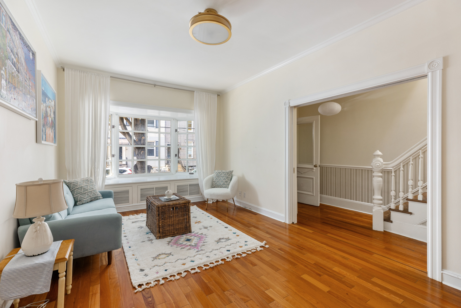 a living room with furniture and a table