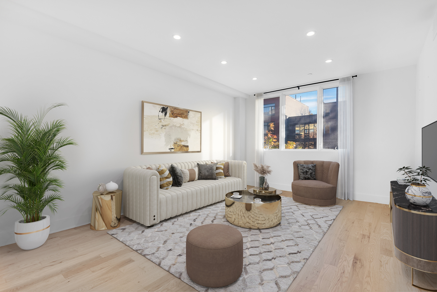 a living room with furniture potted plant and a window