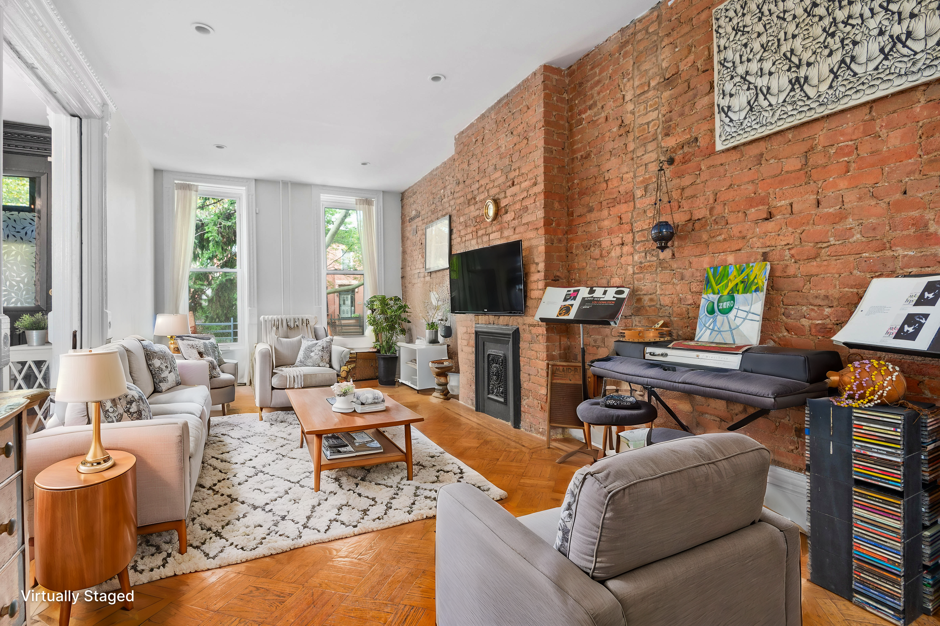 a living room with furniture and a flat screen tv