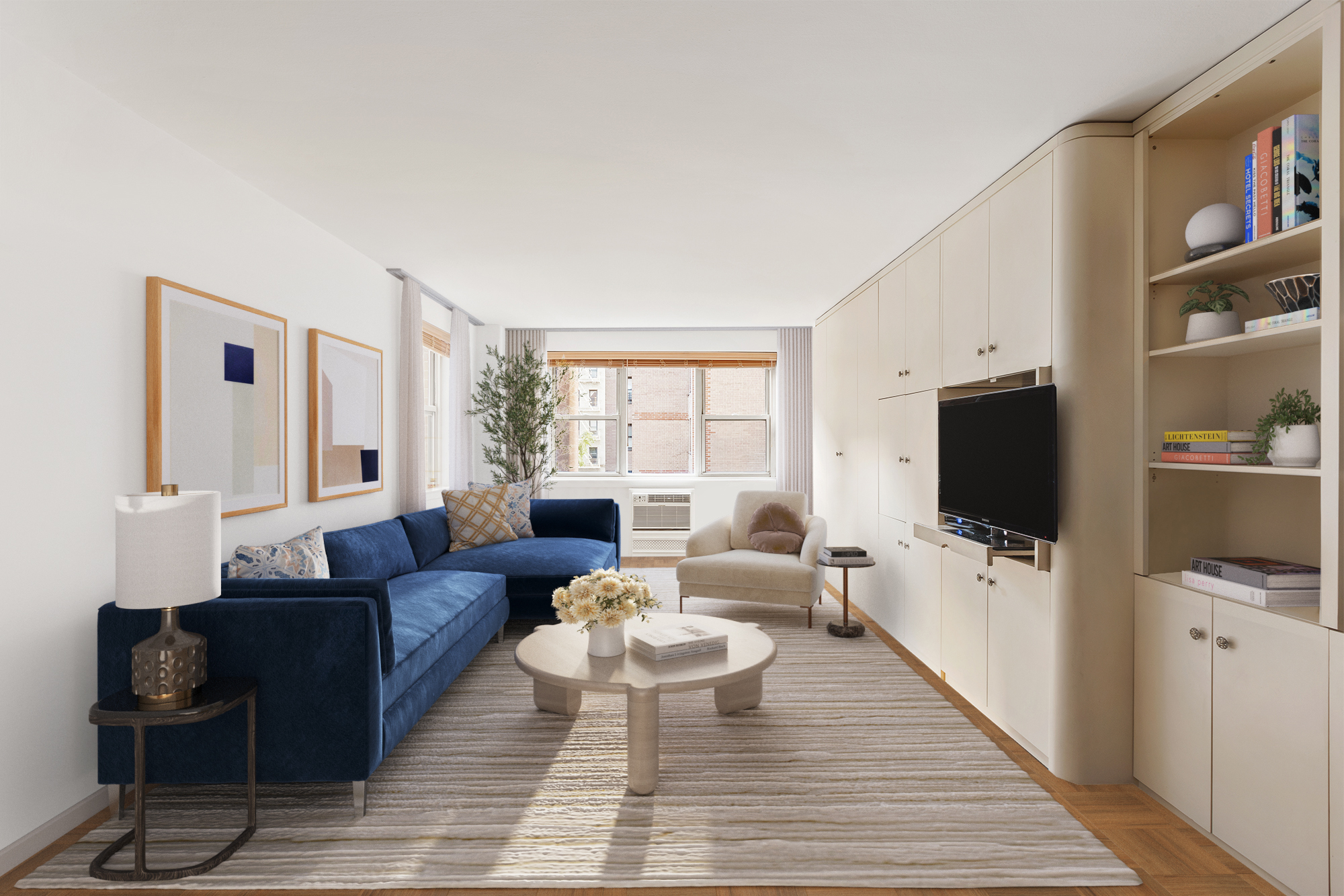 a living room with furniture wooden floor and a flat screen tv