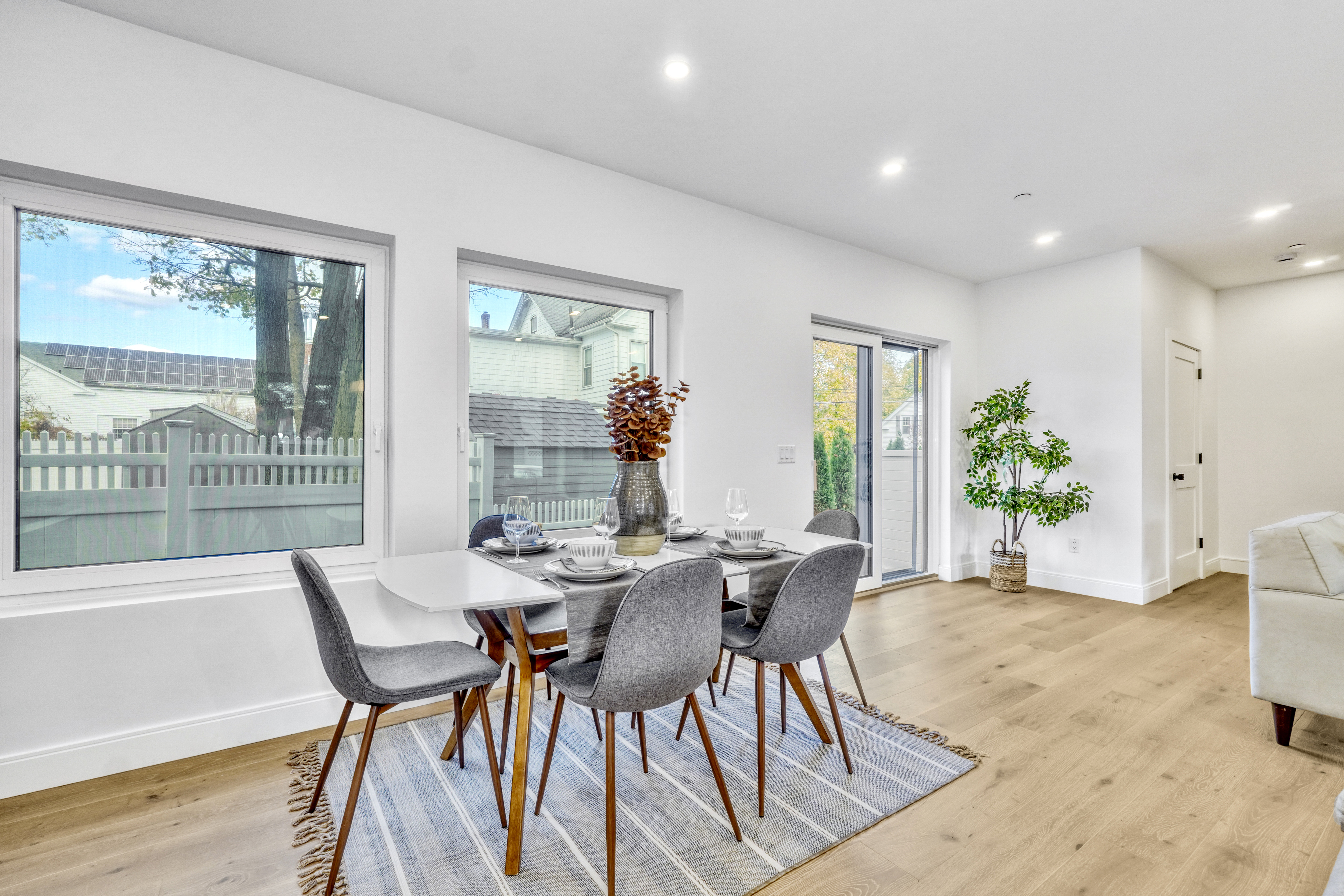 a view of a dining room with furniture window and outside view