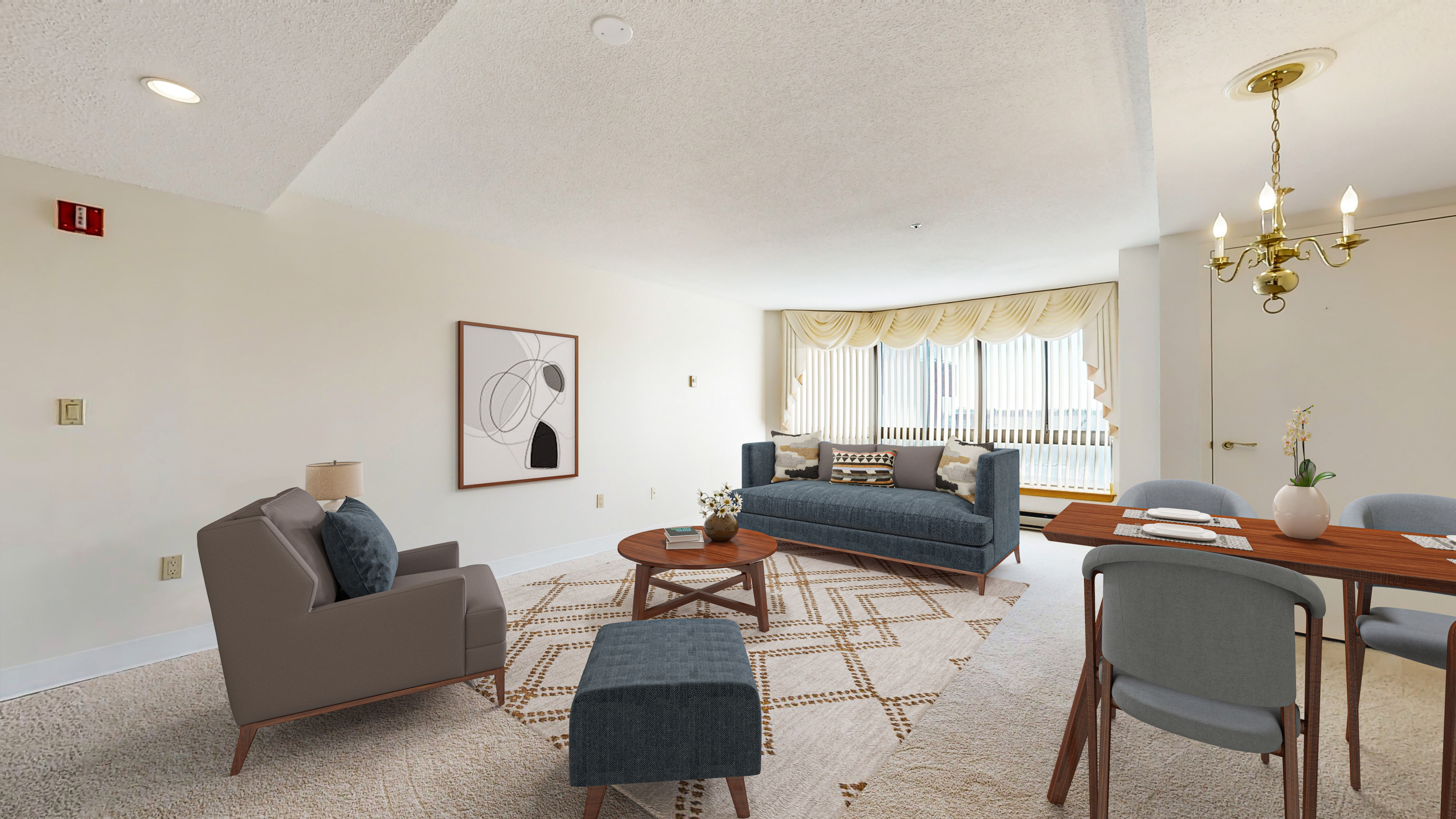 a living room with furniture and a window