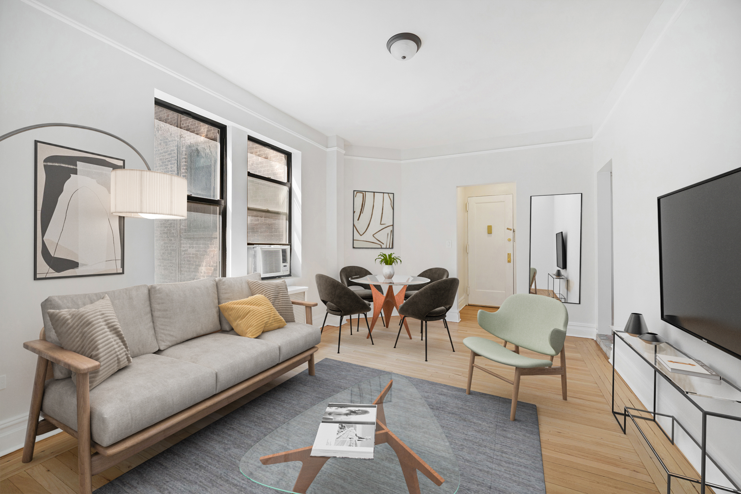 a living room with furniture and a flat screen tv