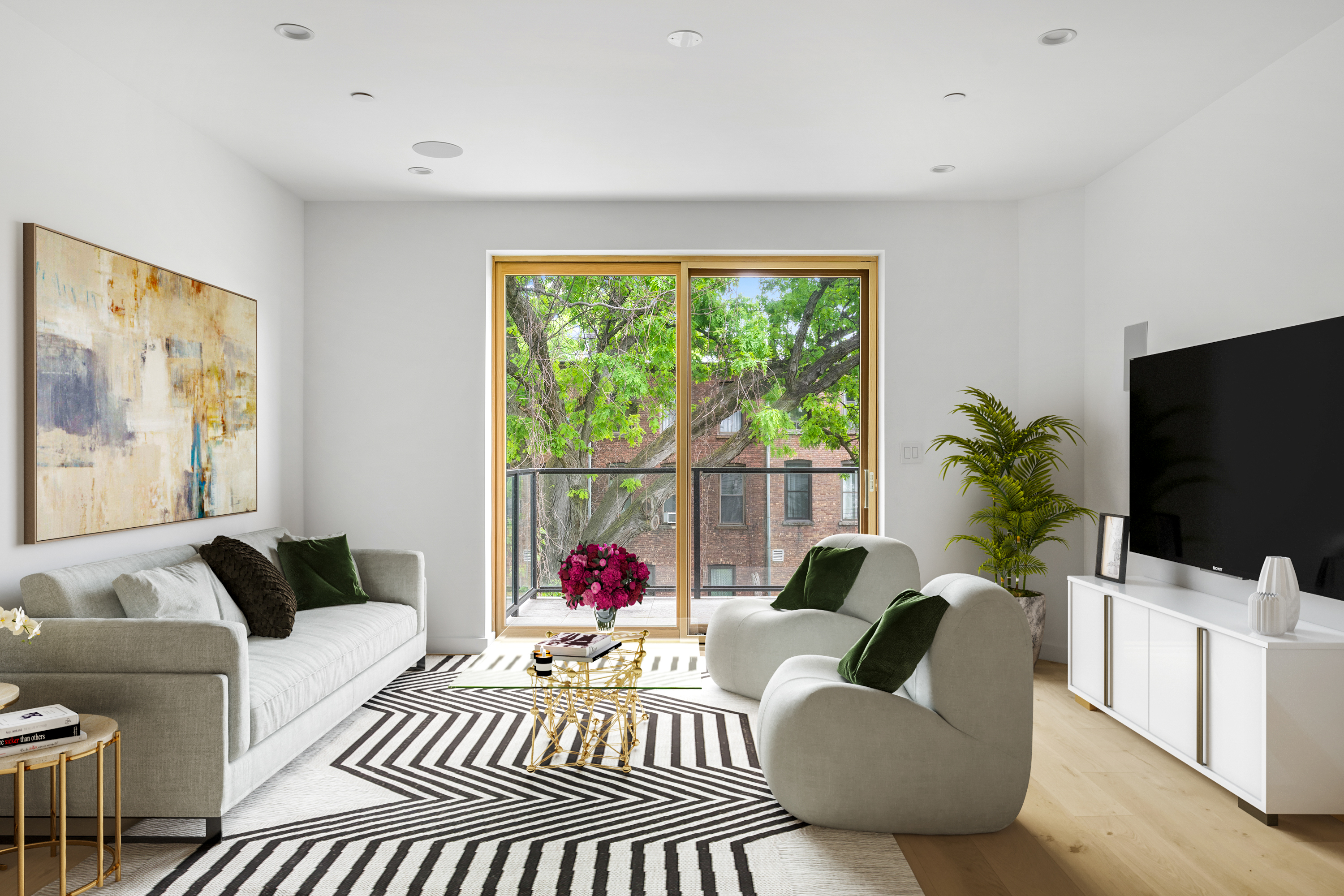 a living room with furniture a flat screen tv and a floor to ceiling window