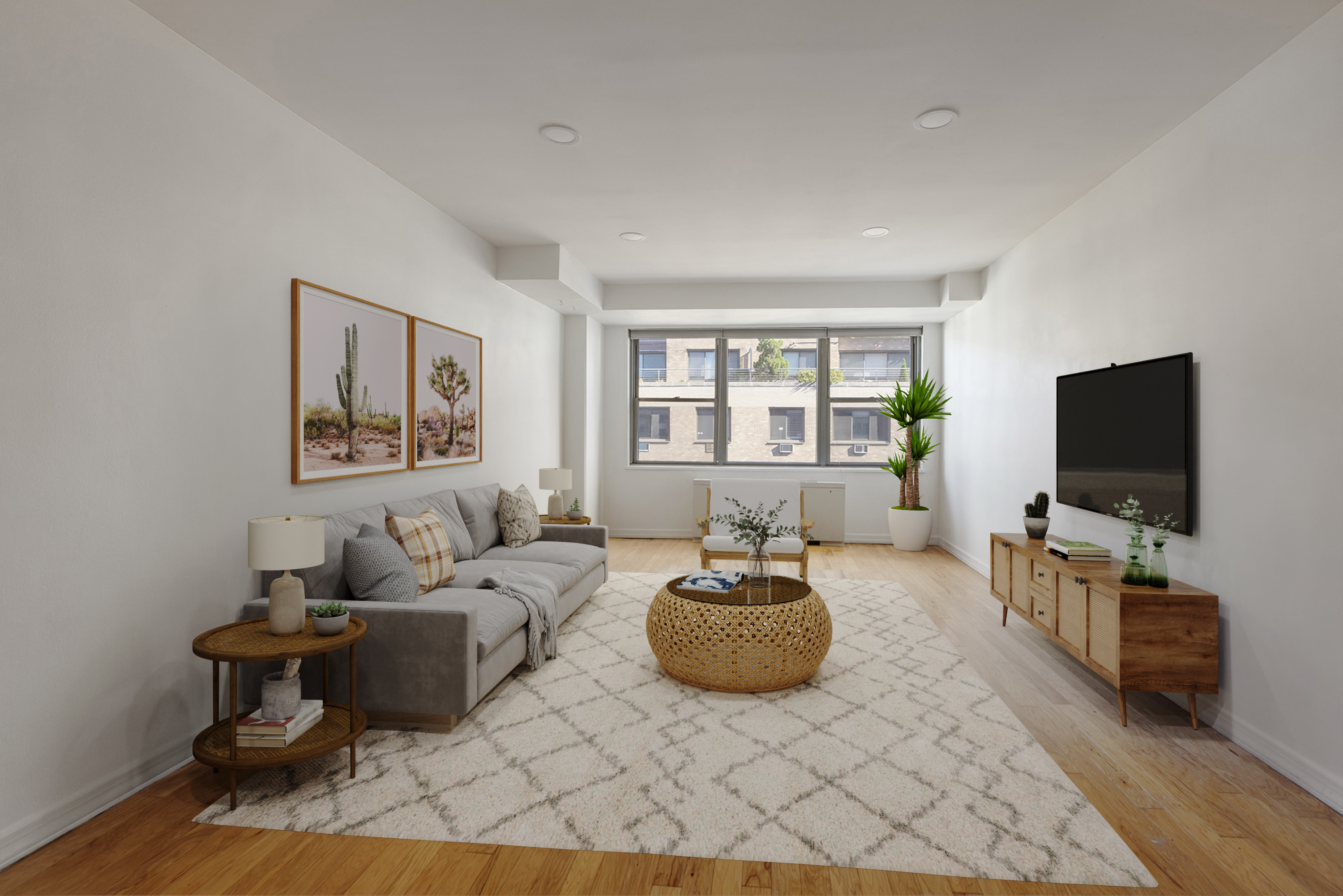 a living room with furniture a flat screen tv and a window