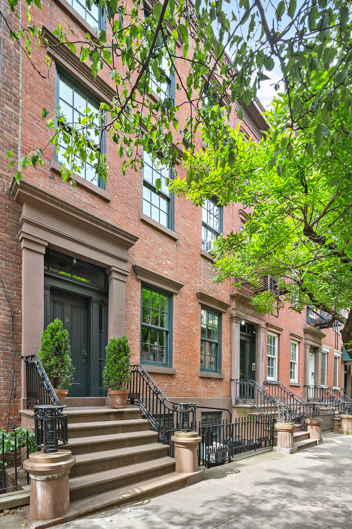 a front view of a house with a porch