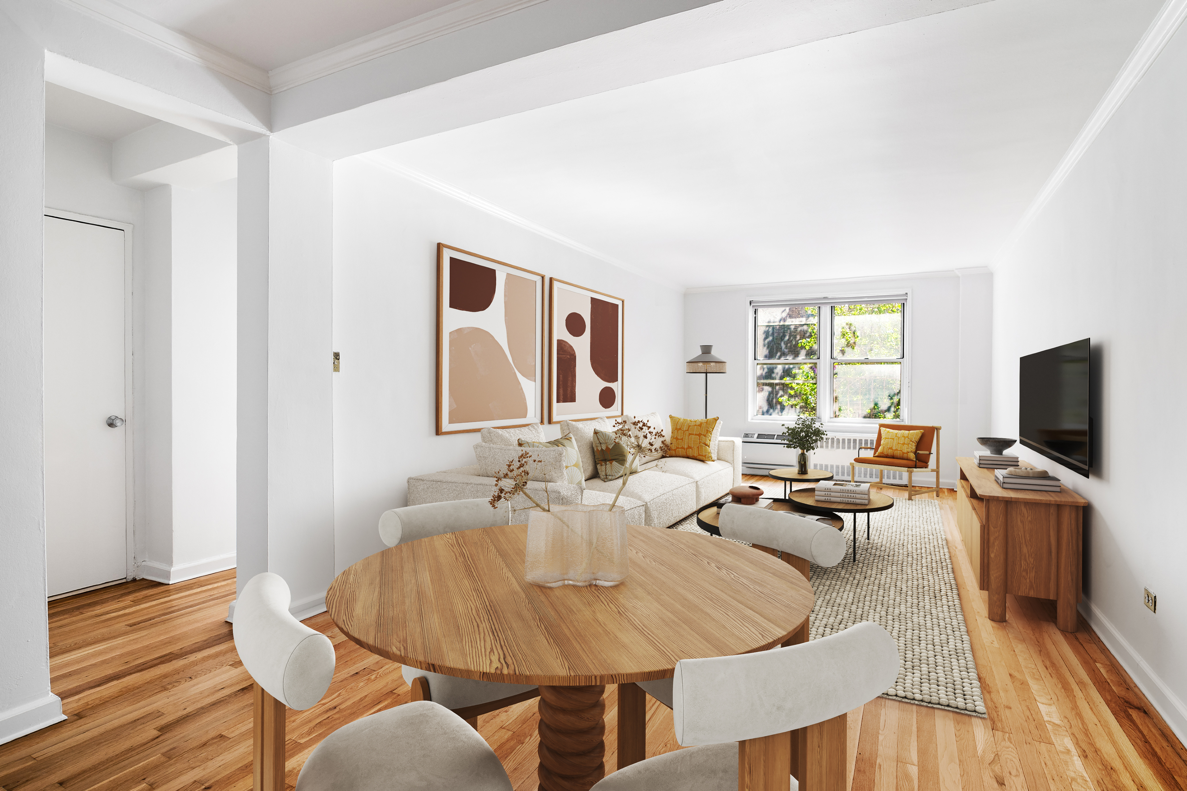 a living room with furniture and a flat screen tv