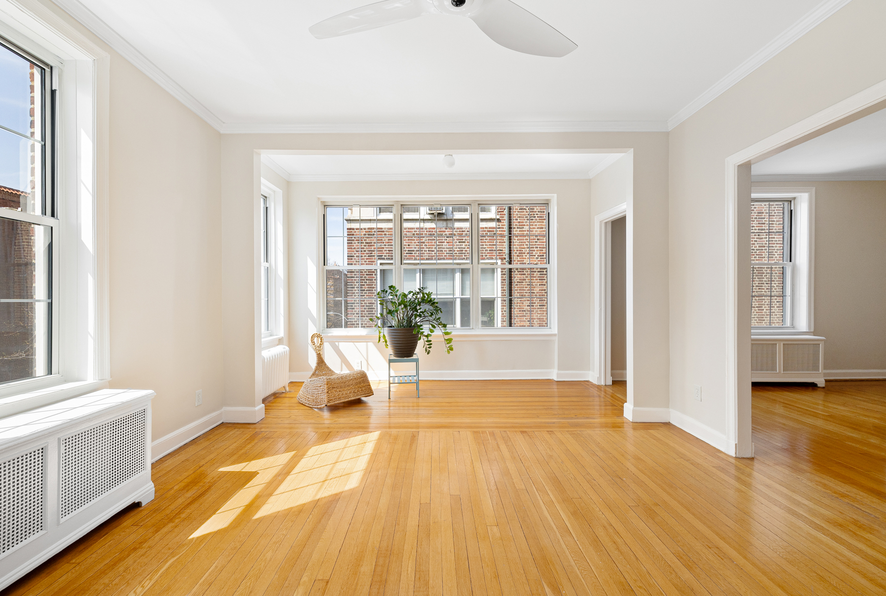 a view of a living room with a large window