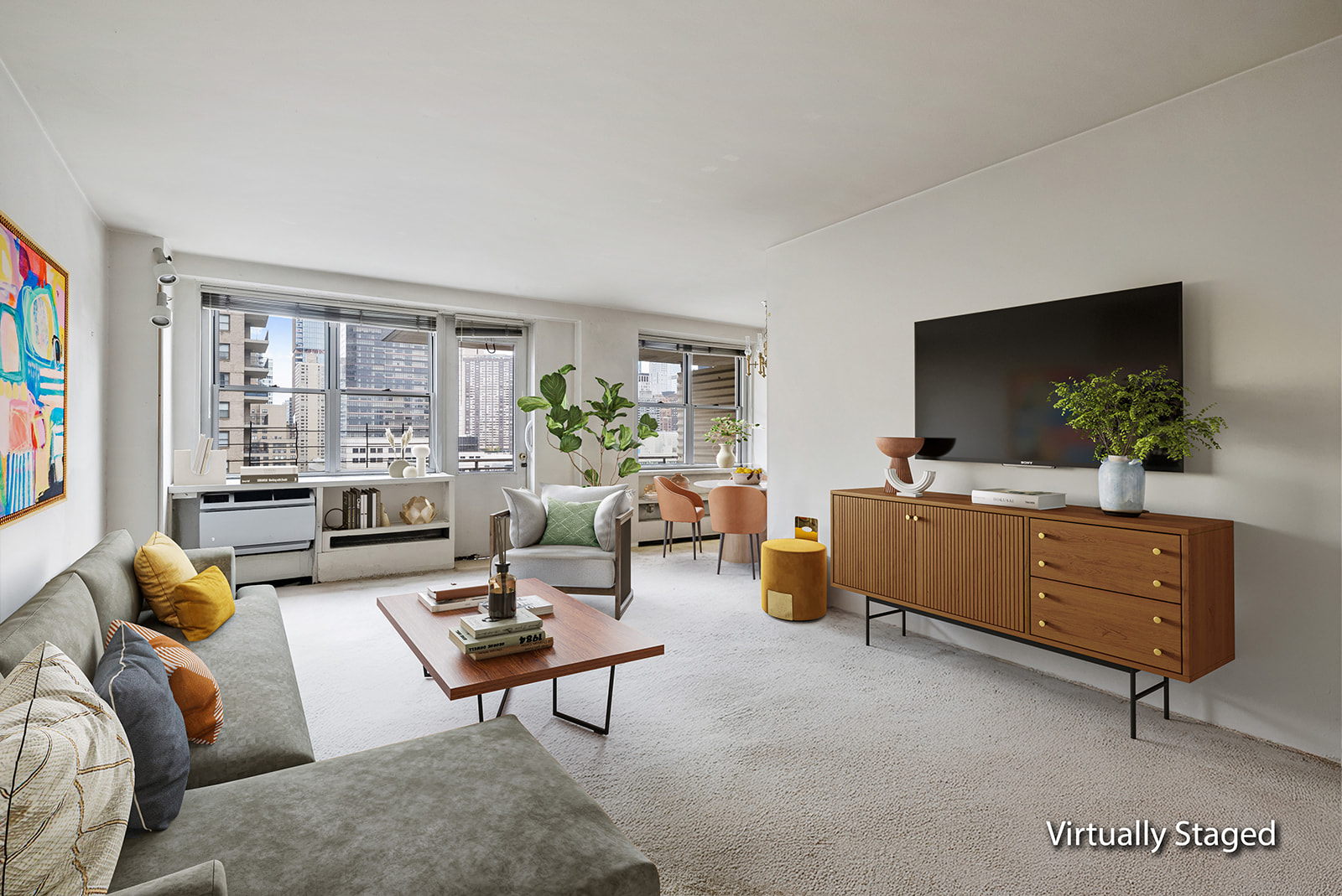 a living room with furniture and a flat screen tv