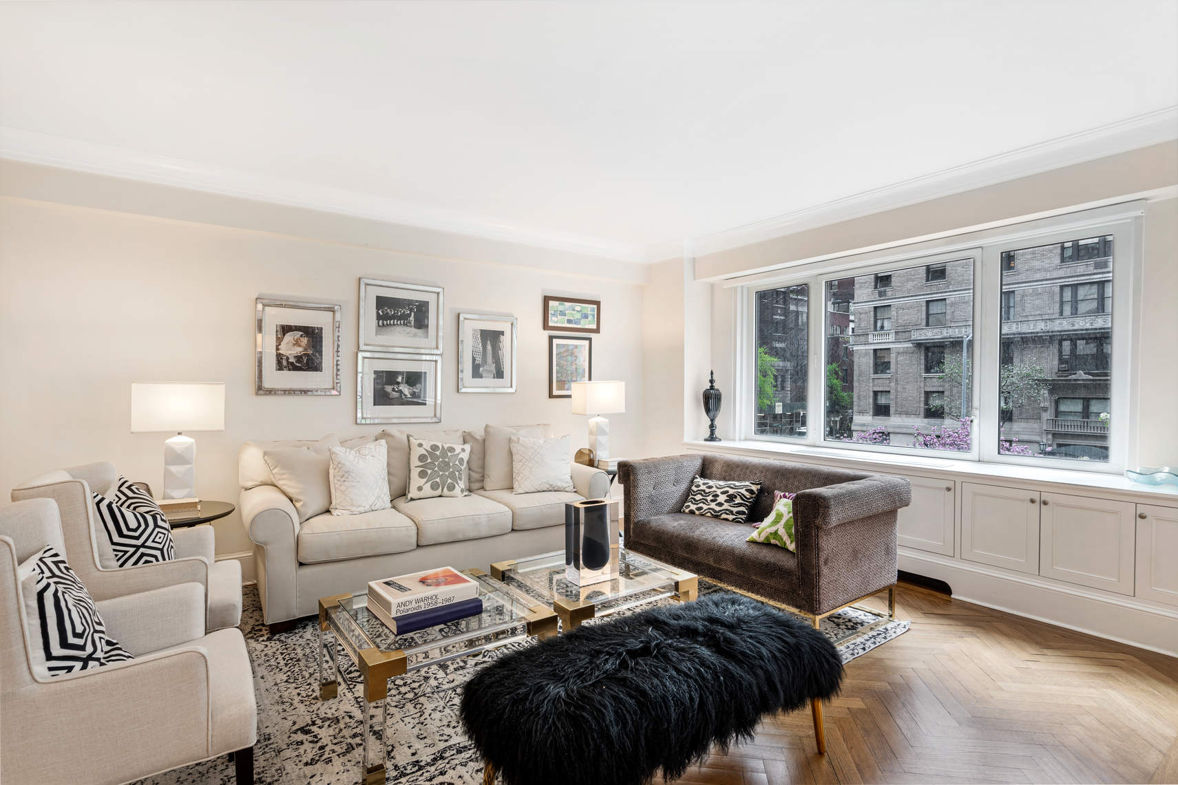 a living room with furniture and windows