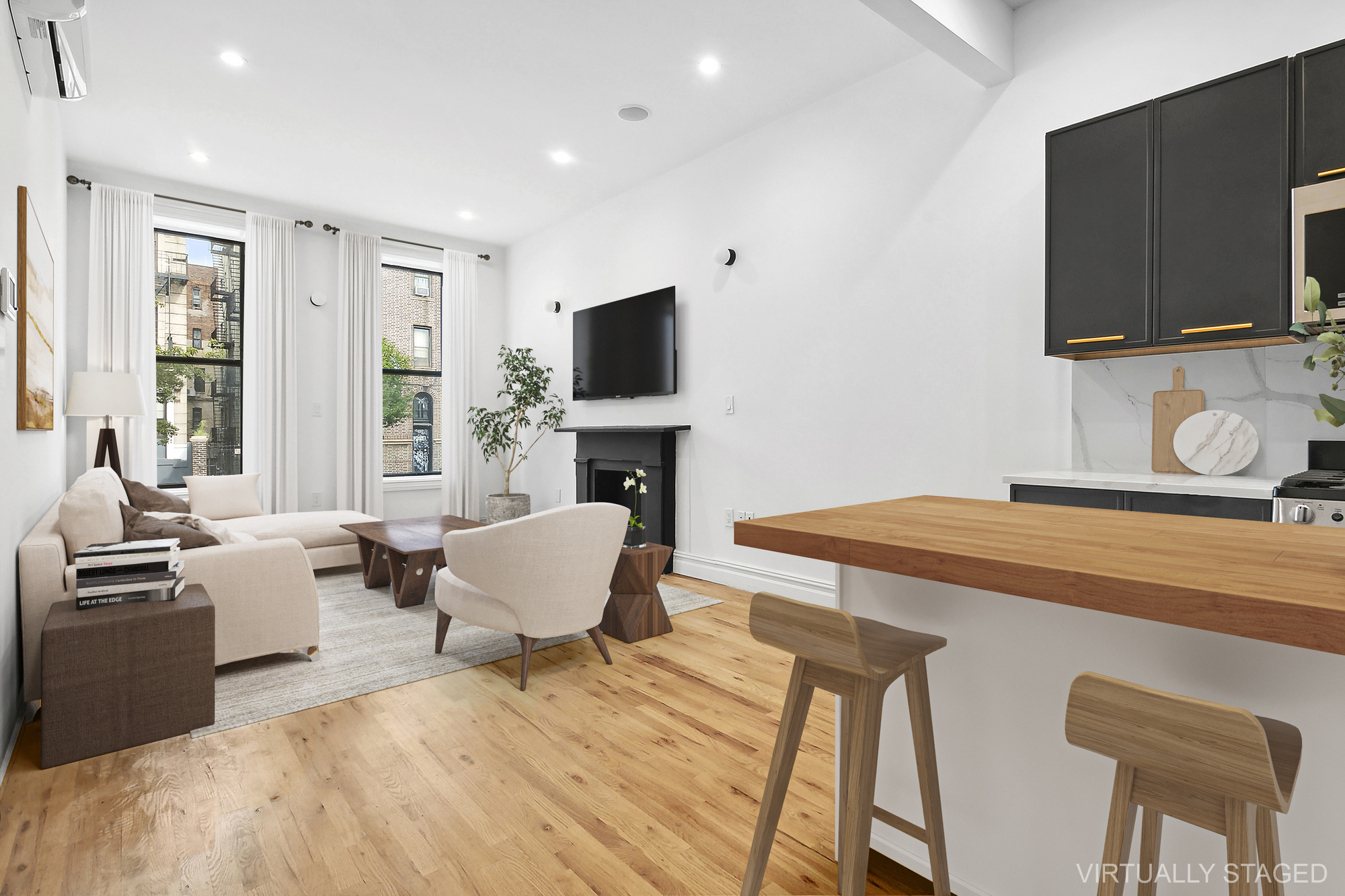 a living room with furniture a flat screen tv and large window