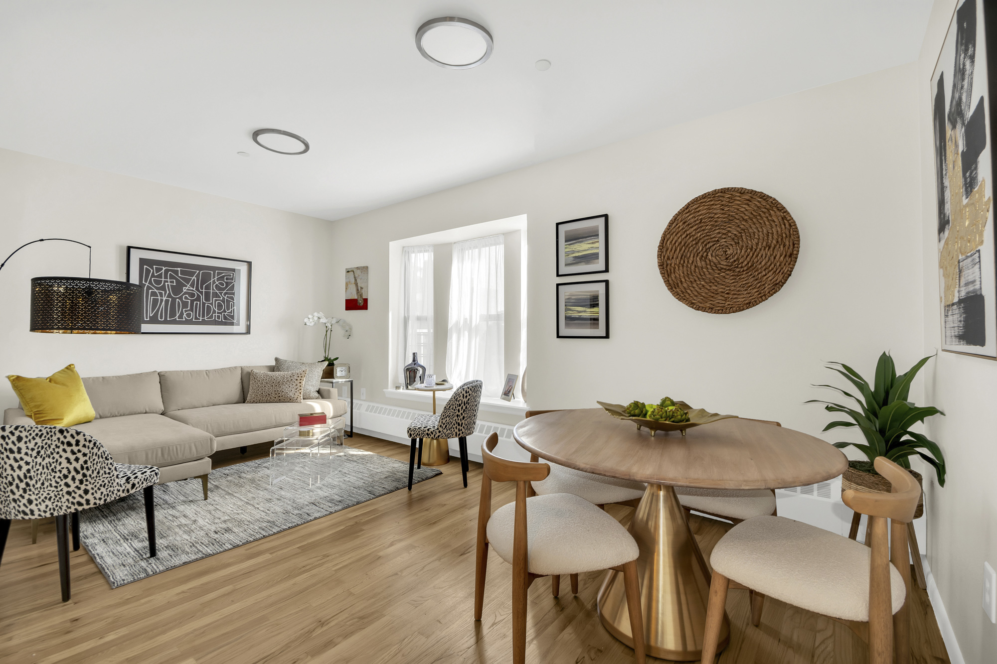 a living room with furniture and a table