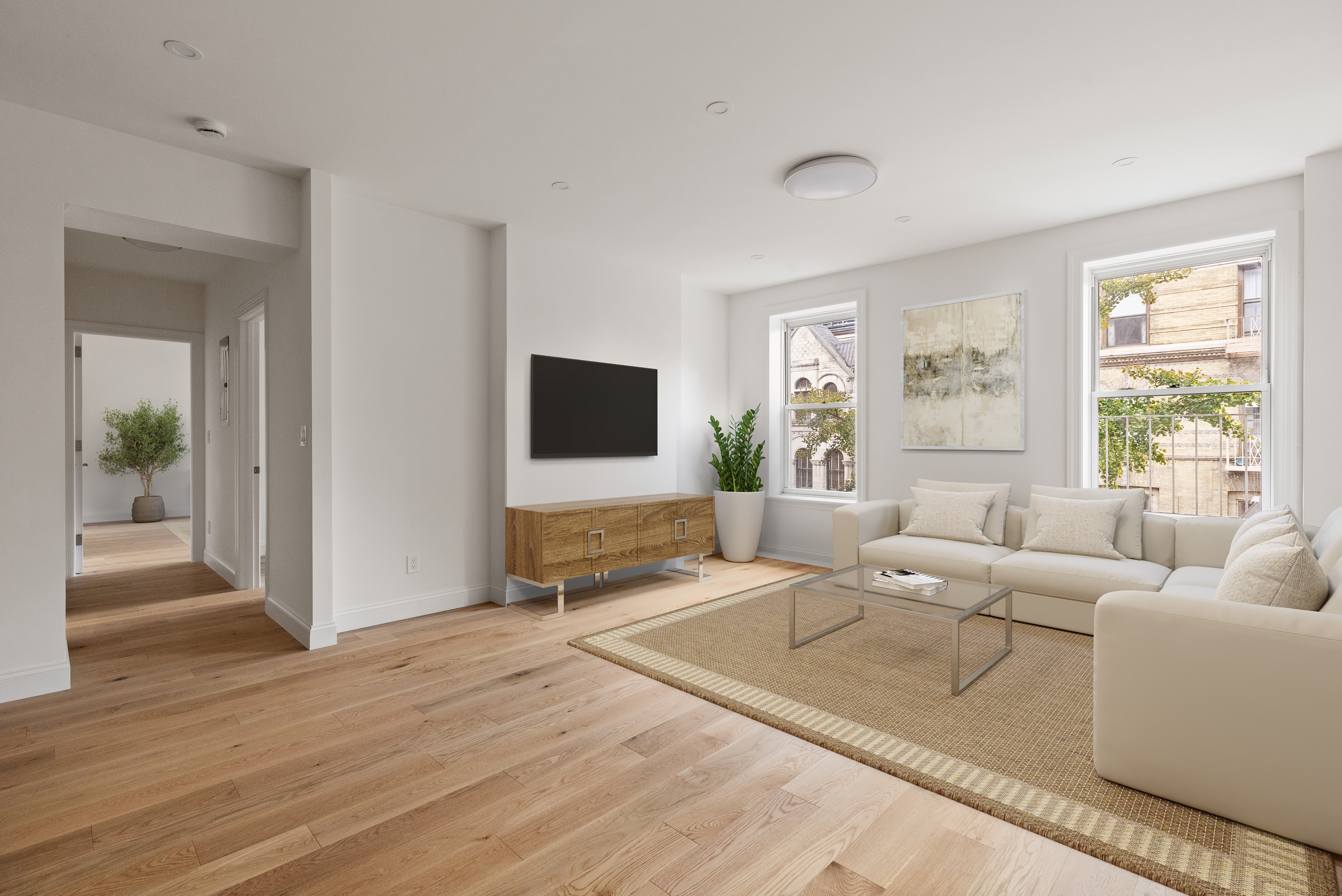 a living room with furniture and a flat screen tv