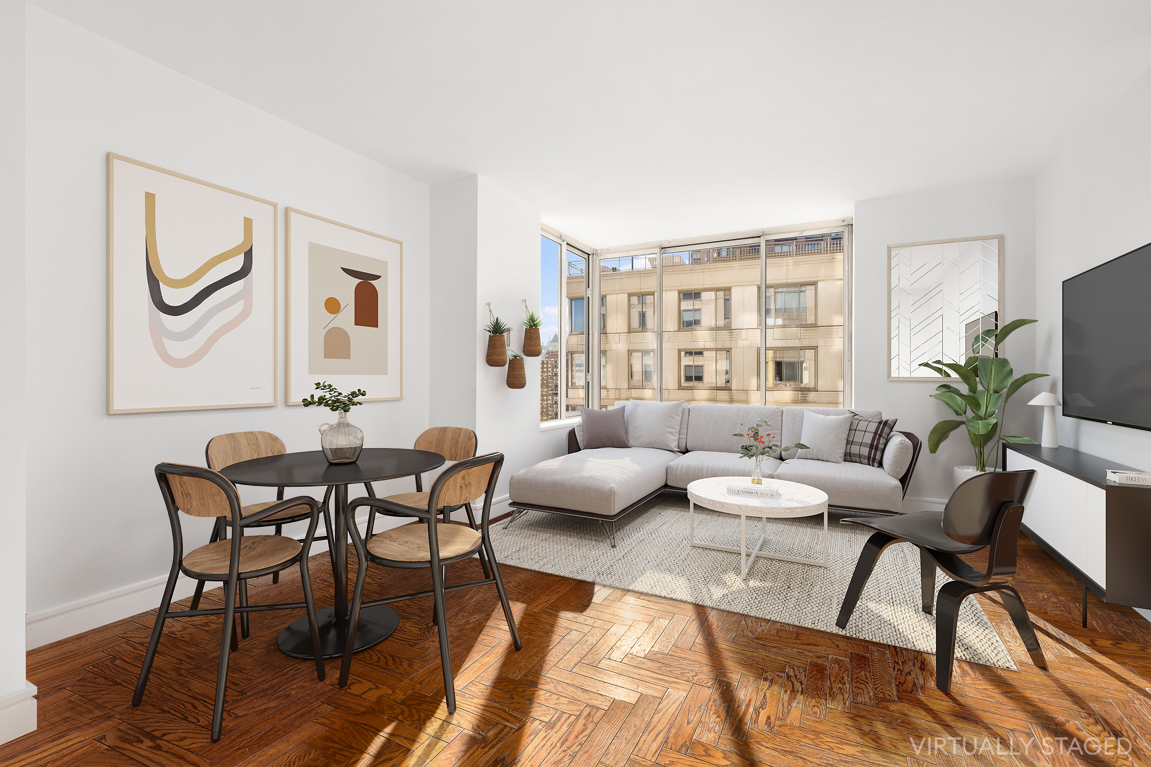 a dining room with furniture and wooden floor