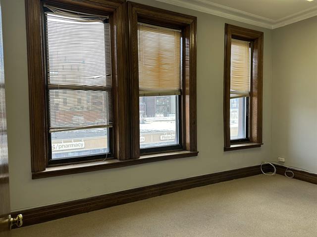 a view of a window in an empty room