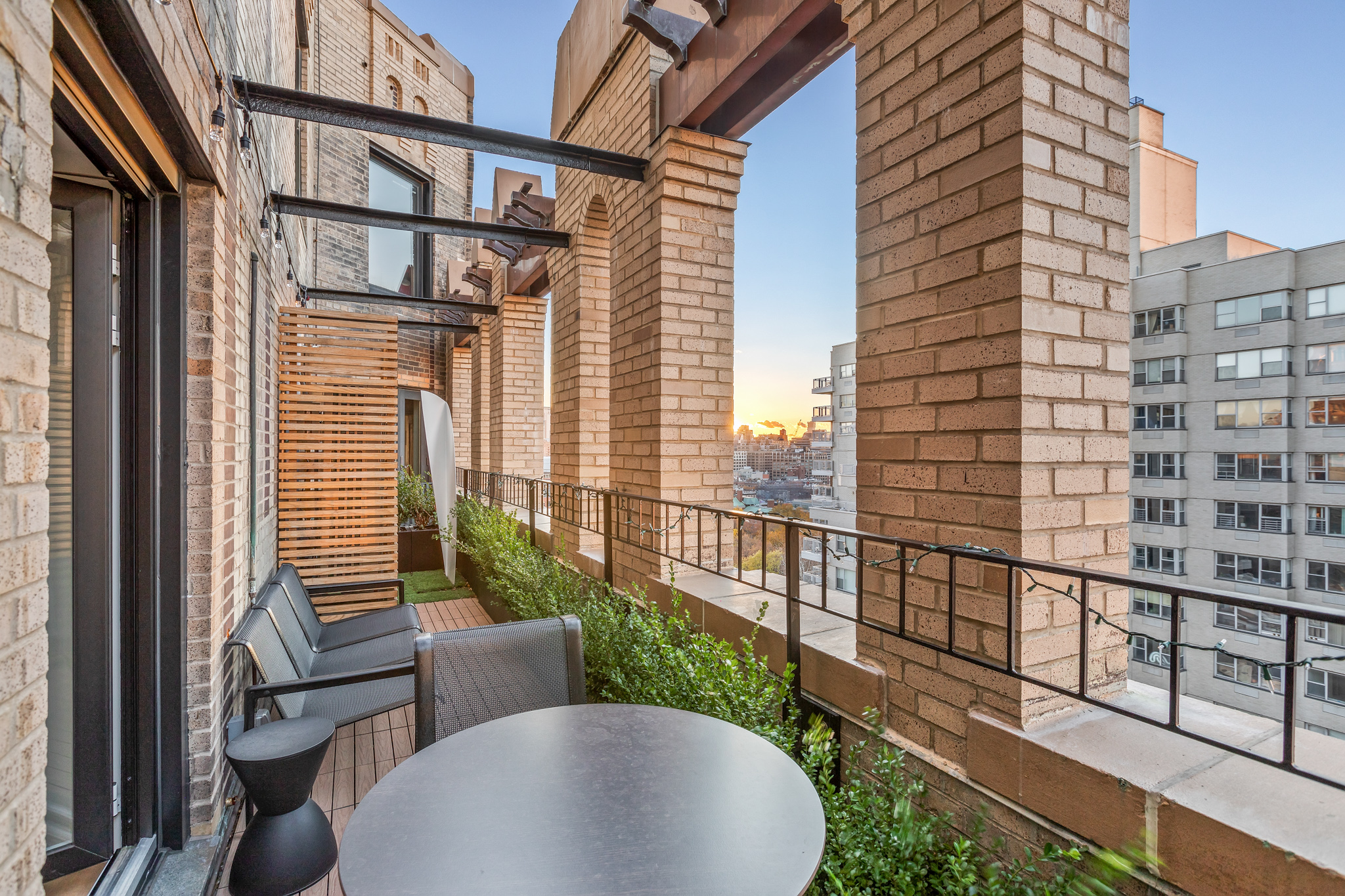 a view of a balcony with chairs