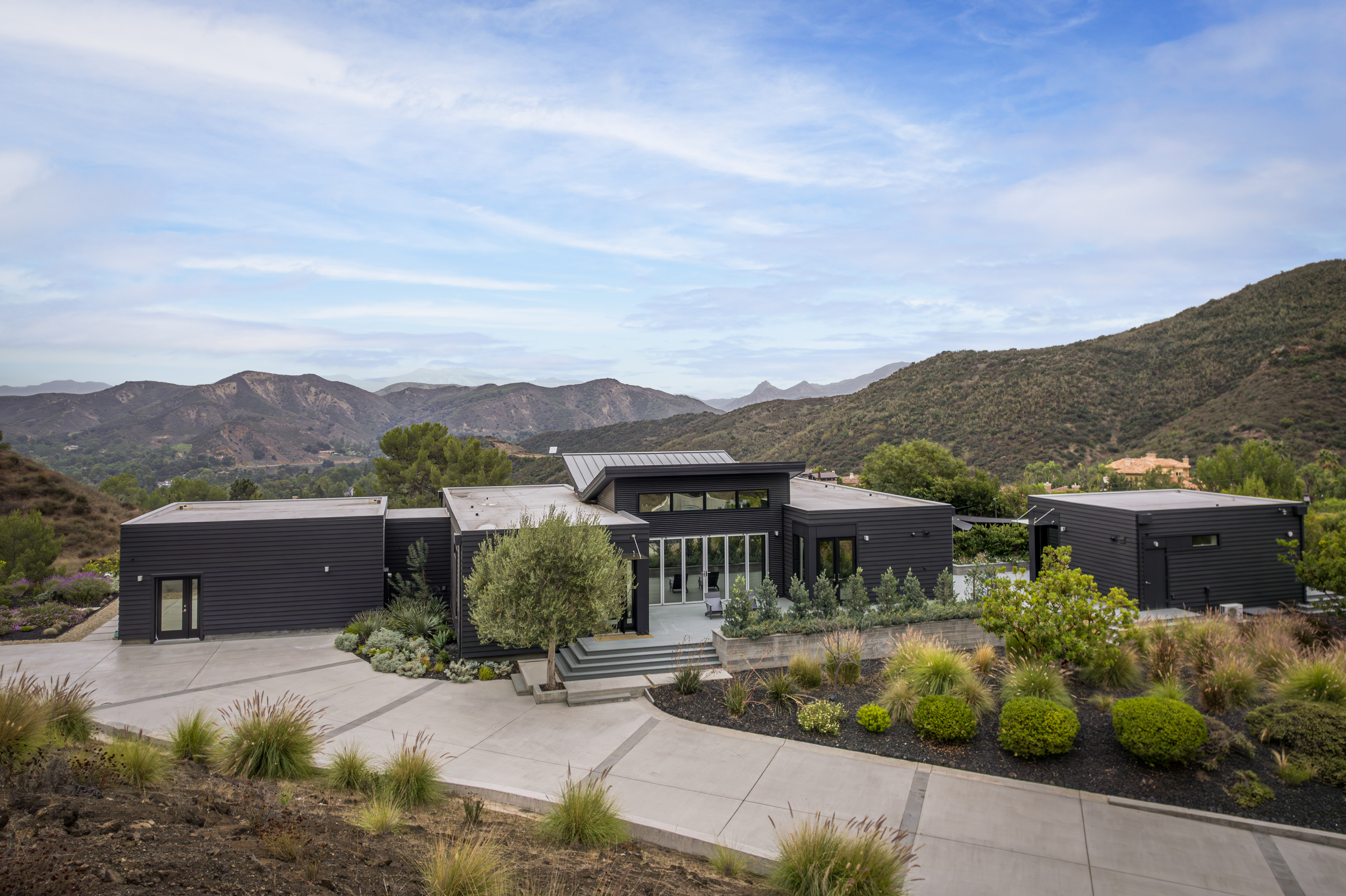 an aerial view of a house with a garden