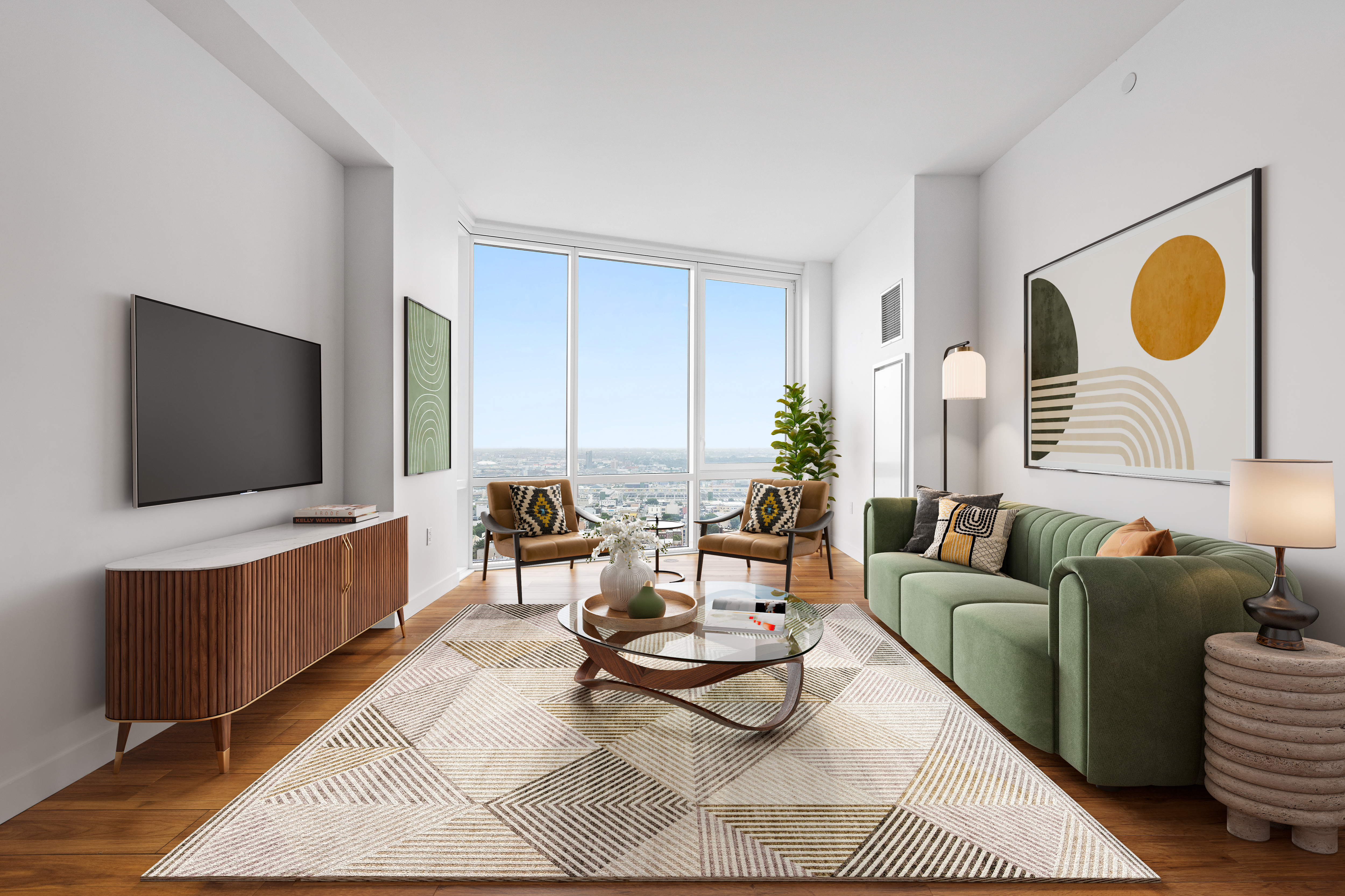 a living room with furniture and a flat screen tv