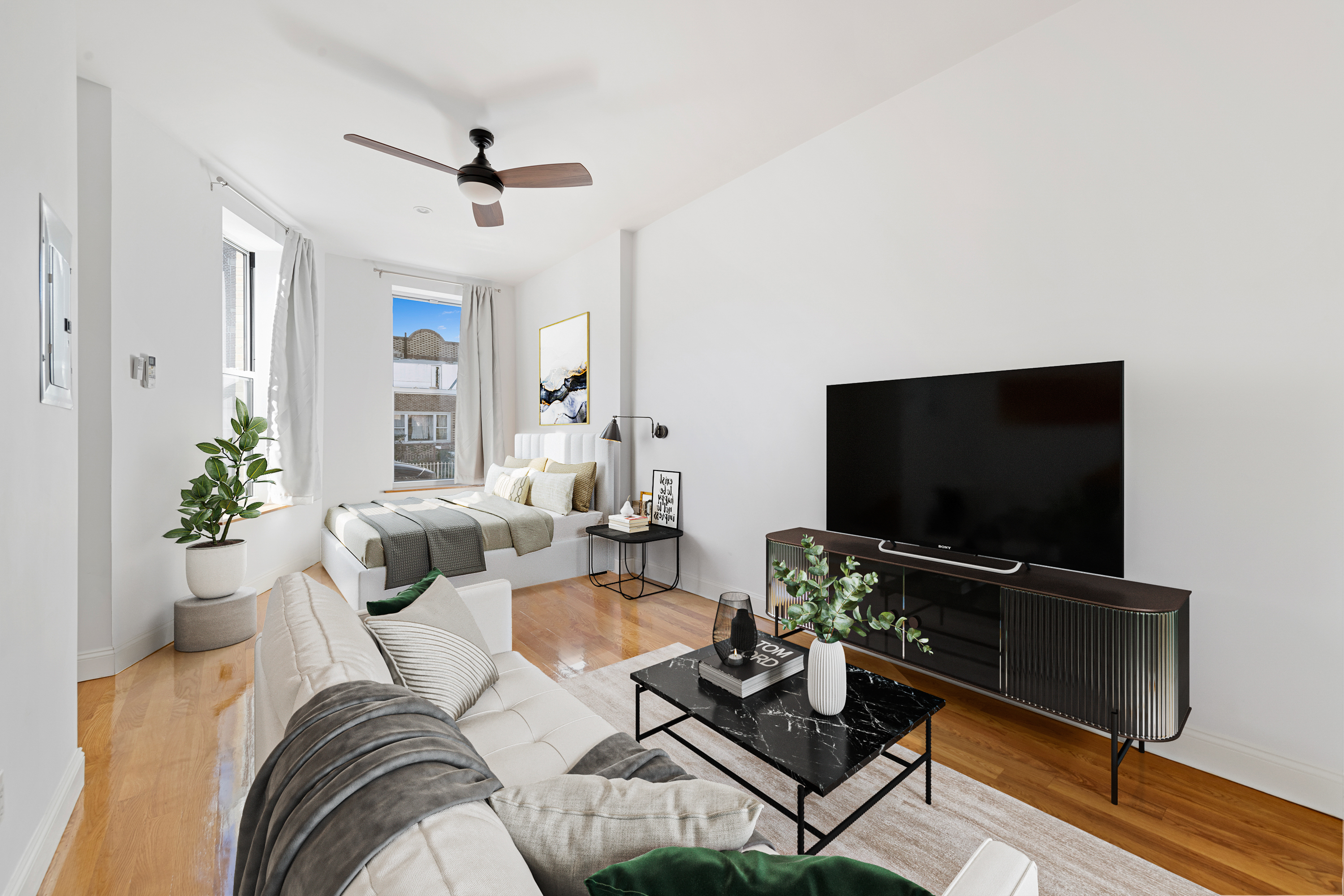 a living room with furniture and a flat screen tv