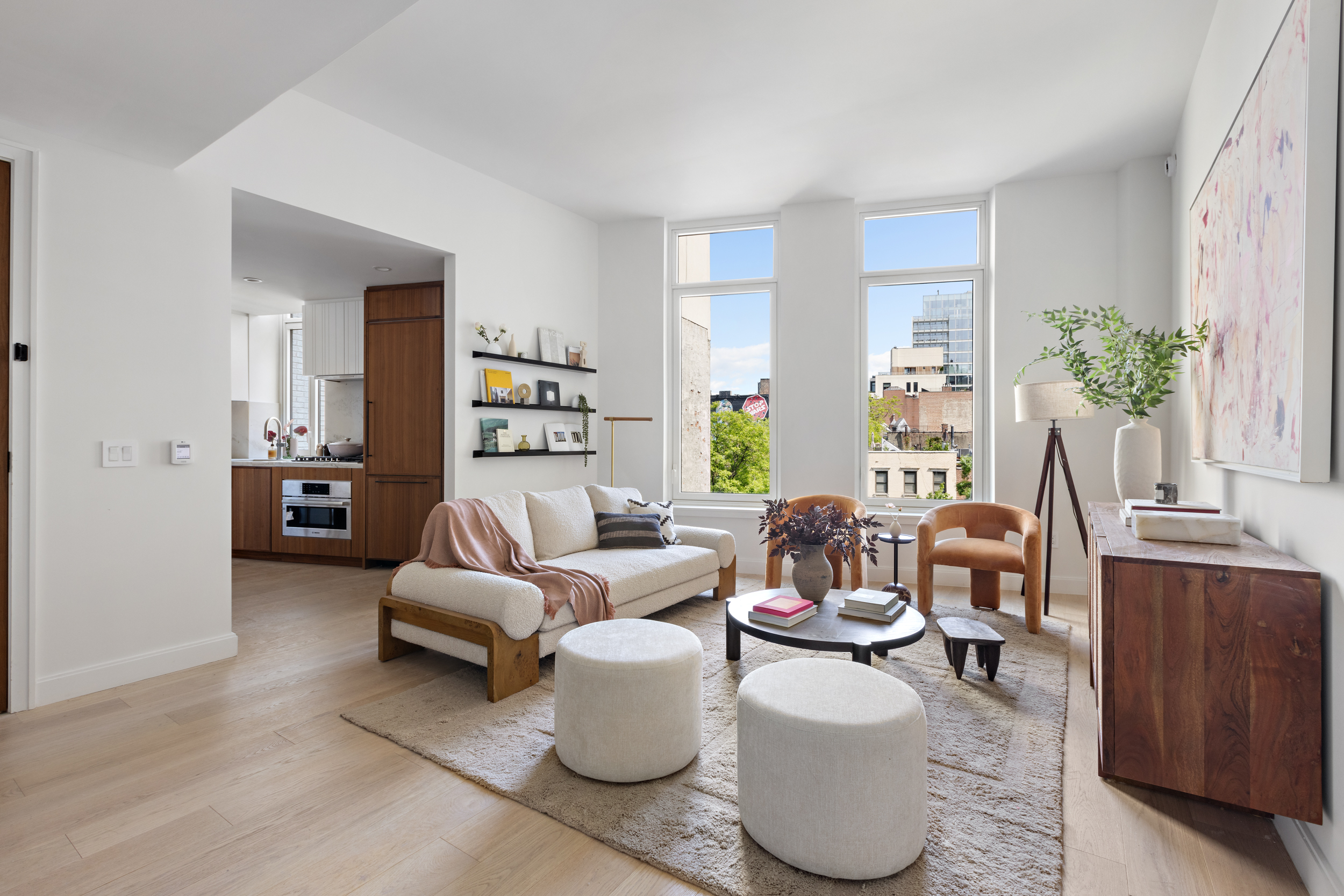 a living room with furniture and decor