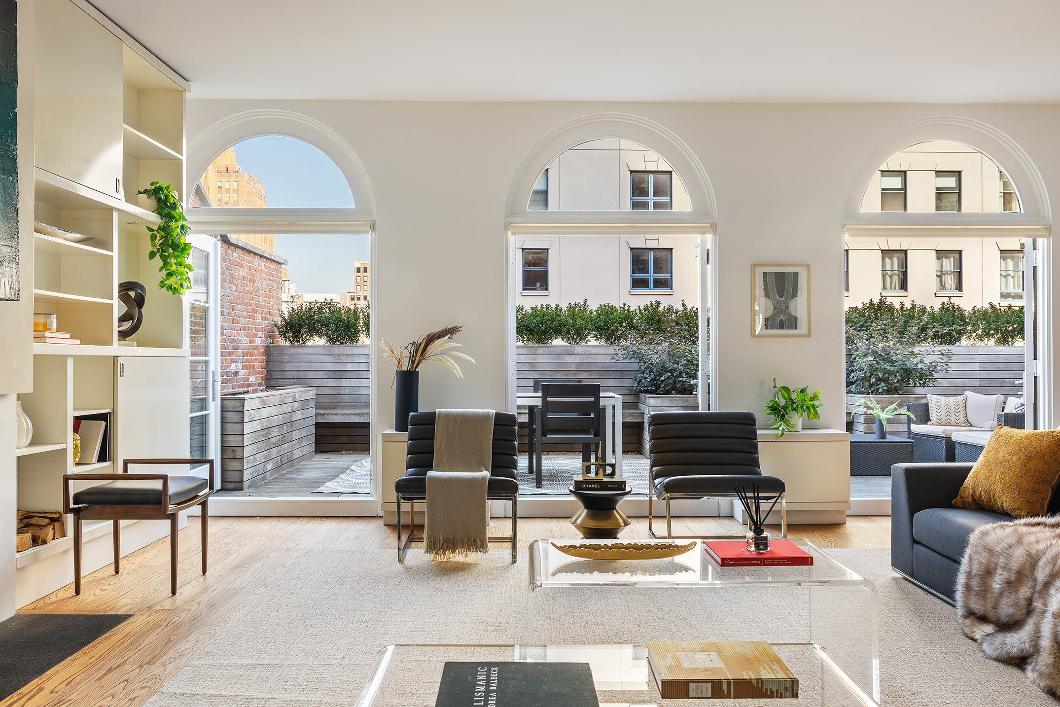 a view of living room filled with furniture