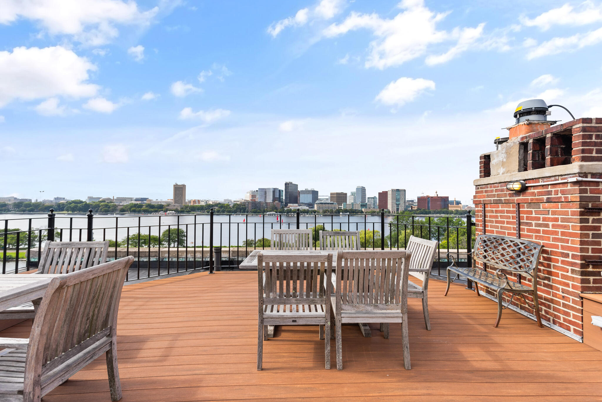 a view of a balcony with furniture